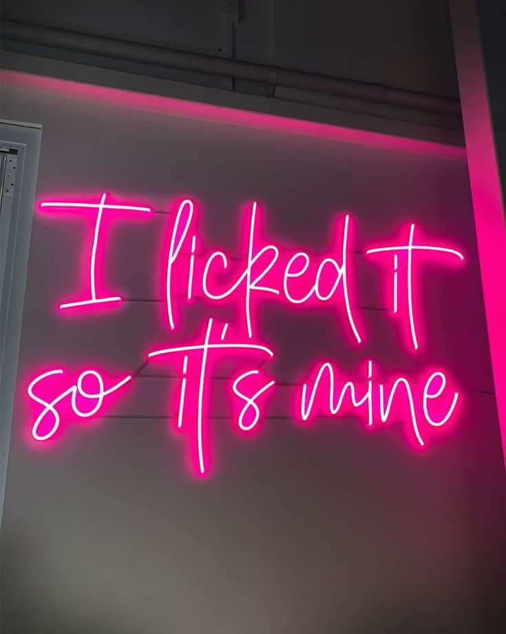 Pink Bad Girl, vibrant pink neon sign, cursive text, SD Phone Wallpaper