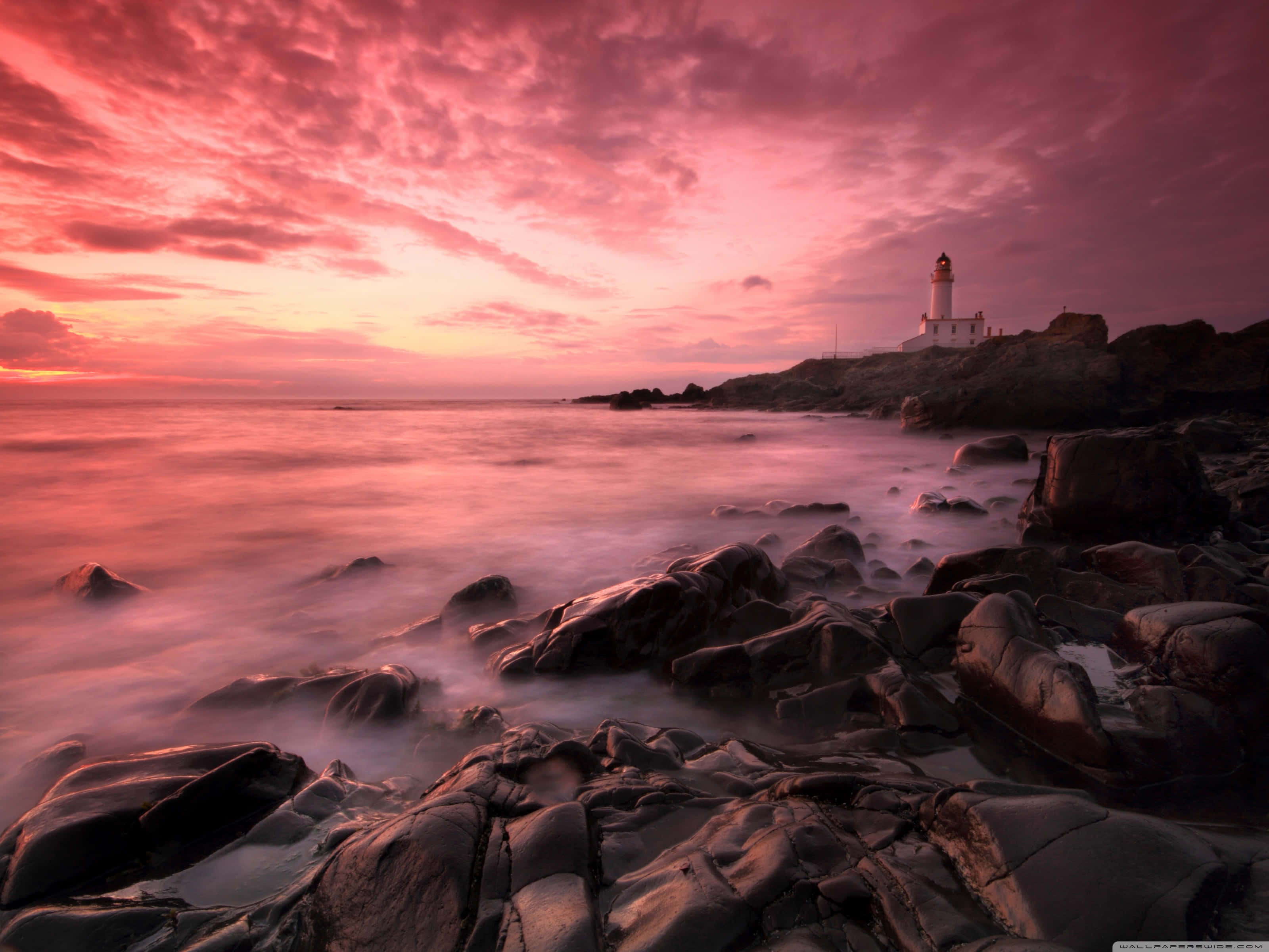 pink beach sunset, lighthouse, rocky shores, 2K Desktop Wallpaper