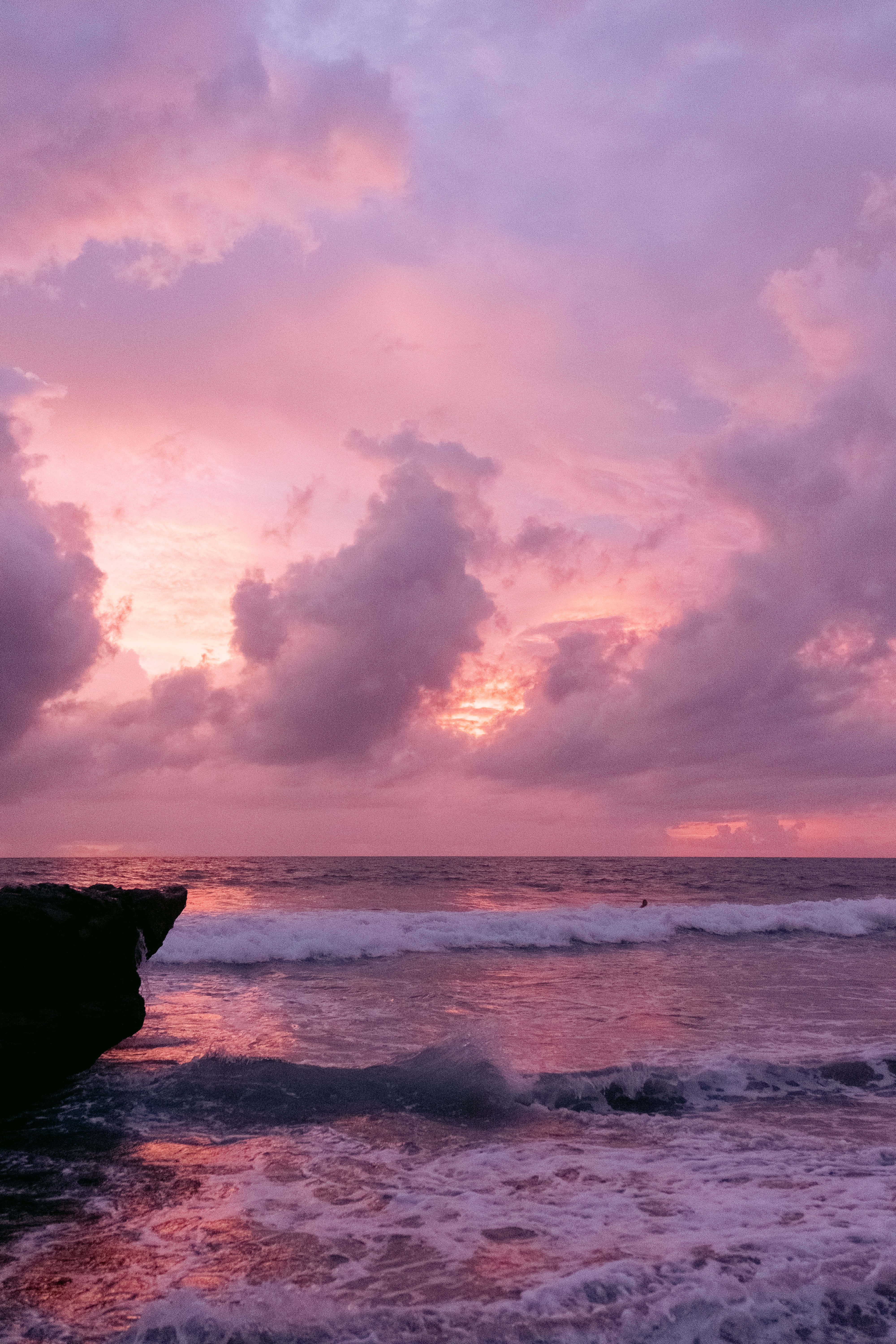 Pink Beach Sunset, pink and purple clouds, foamy waves, 5K Phone Wallpaper