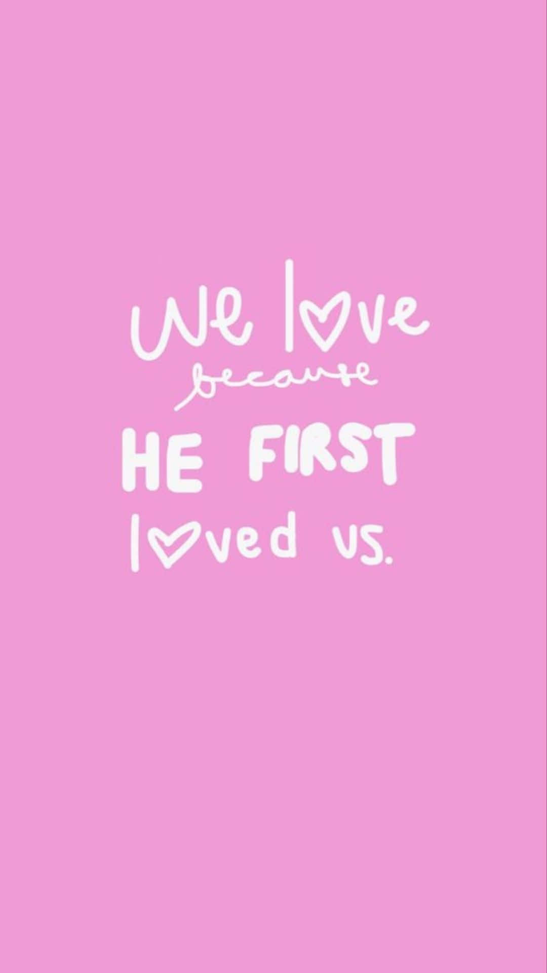 soft pink background, white handwritten text, We love because He first loved us, Full HD Phone Wallpaper