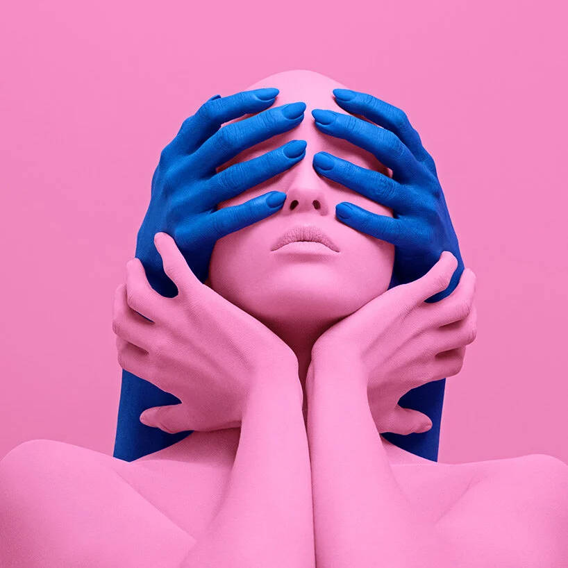 pink model, blue hands, solid pink background, SD Desktop Wallpaper