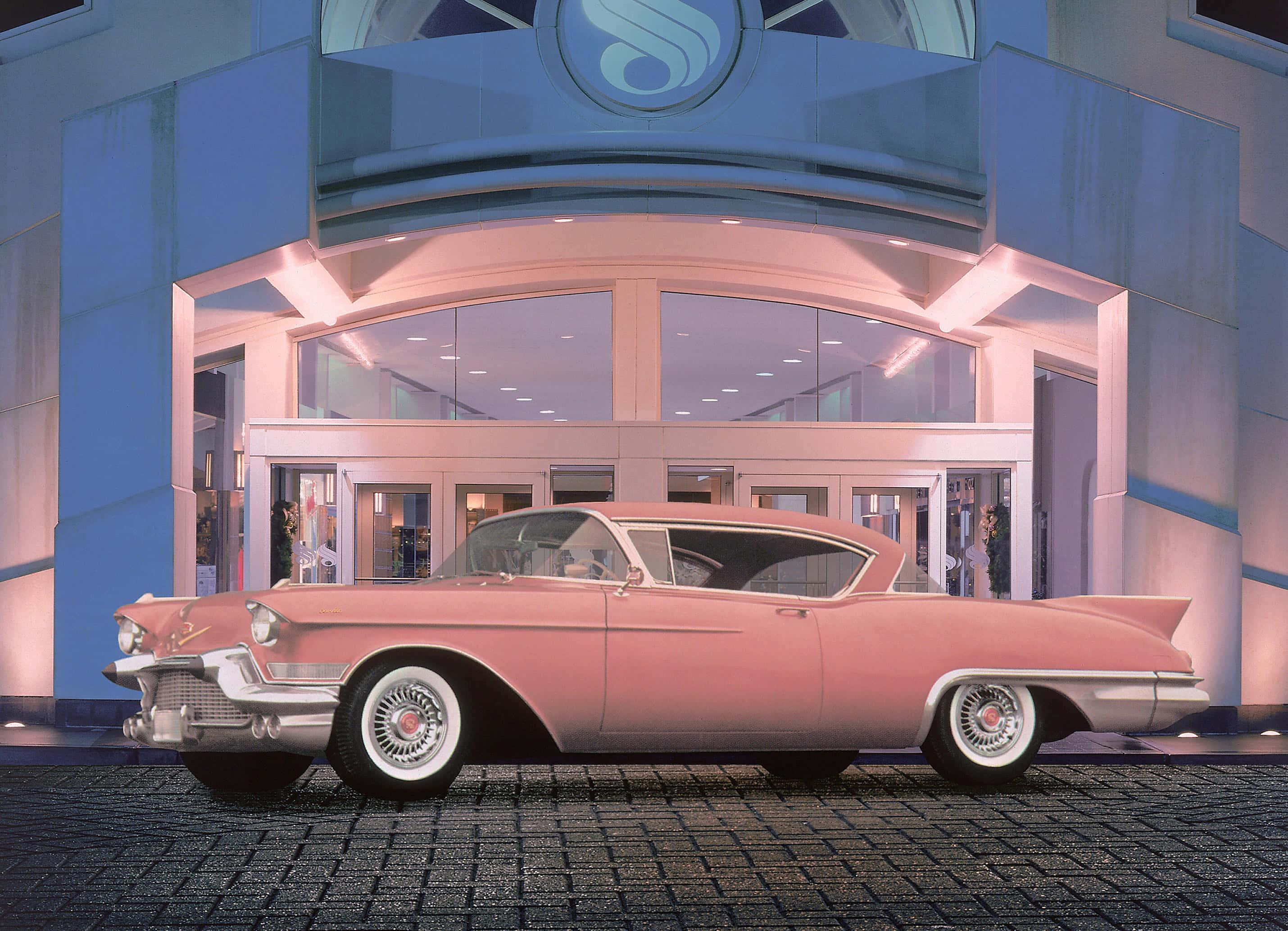 Pink Cadillac, vintage pink Cadillac, modern glass-fronted building, 2K Desktop Wallpaper