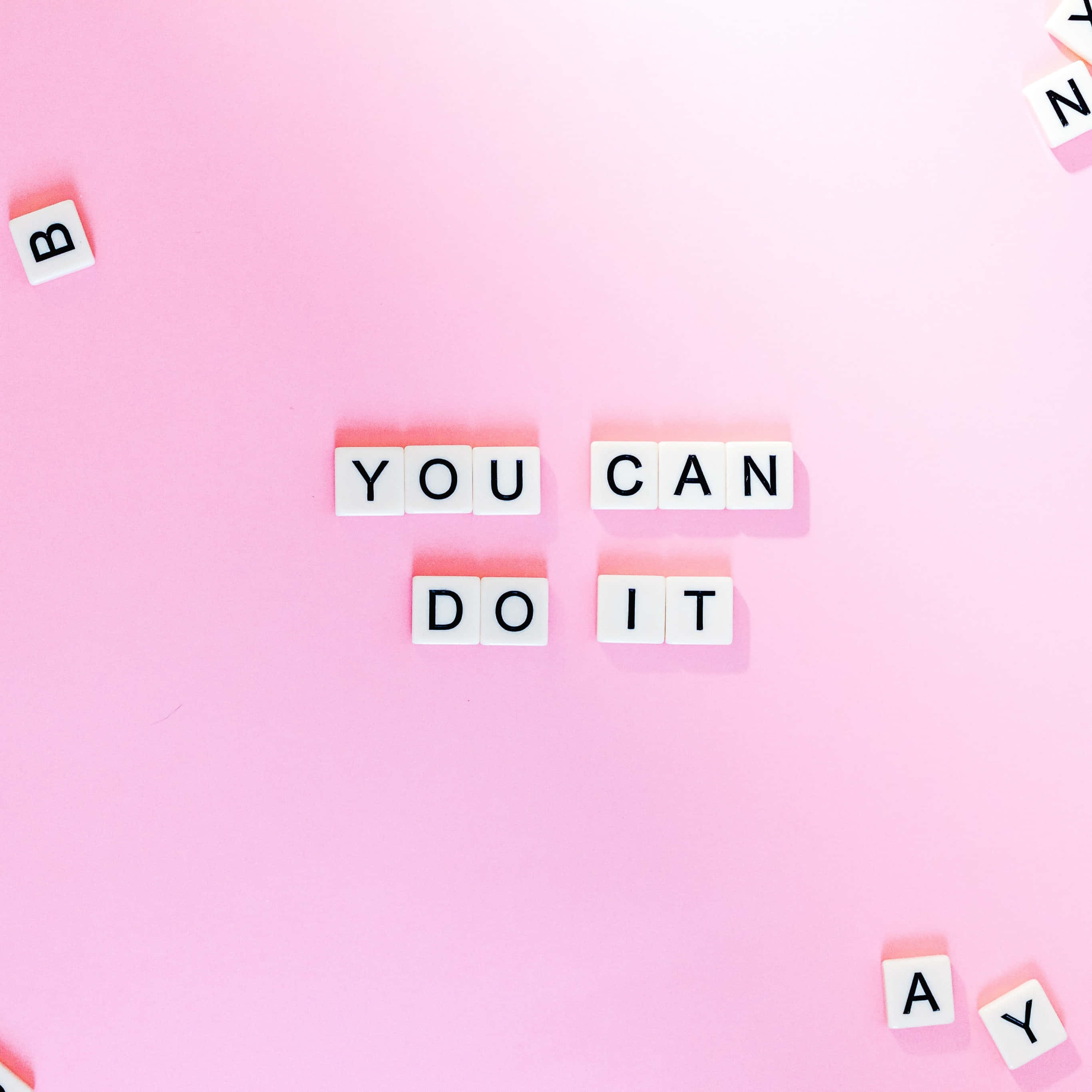 soft pink background, white letter tiles, YOU CAN DO IT, 2K Desktop Wallpaper