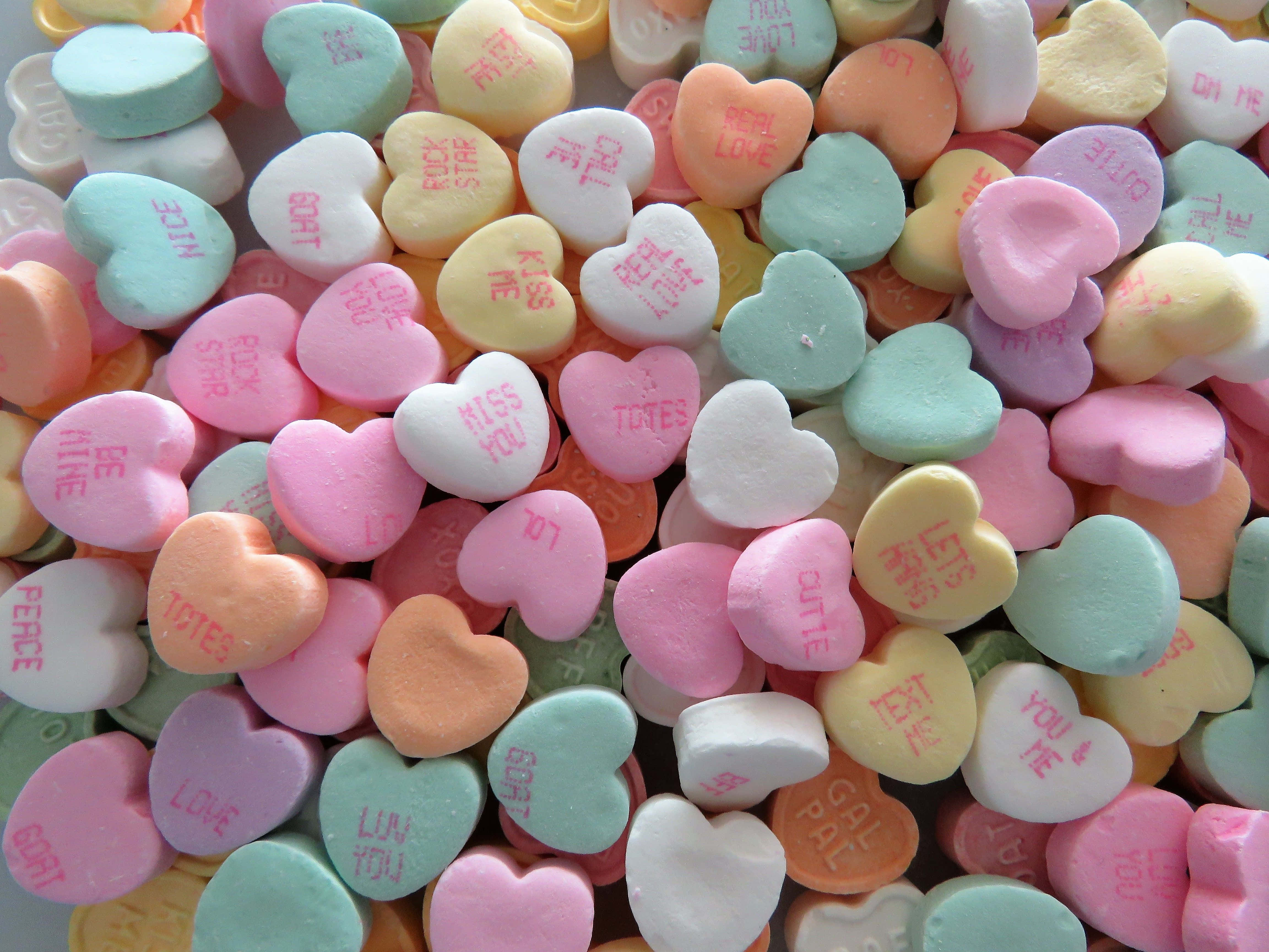 bright pink candy bliss, pastel heart-shaped candies, pink red, 4K Desktop Wallpaper