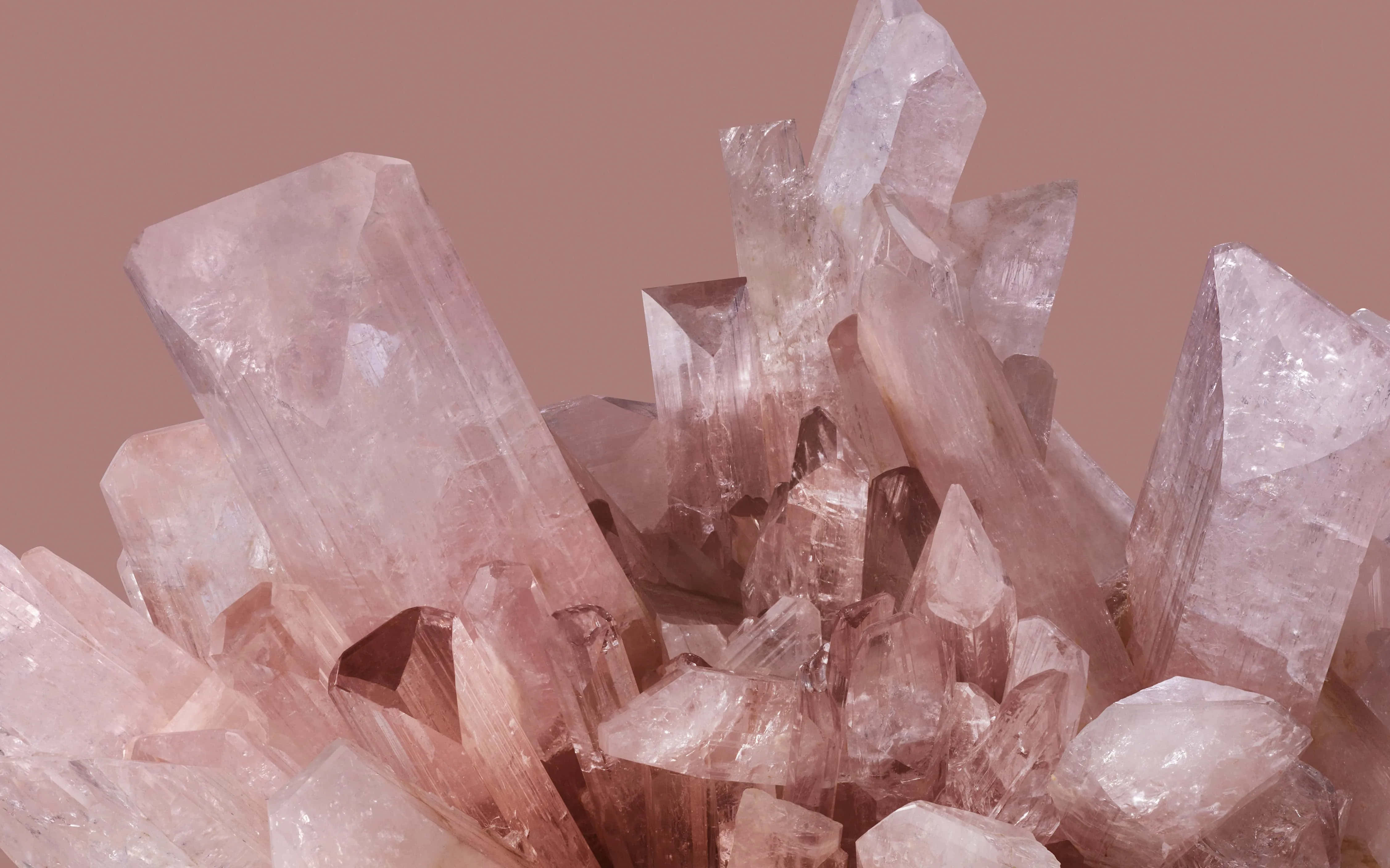 quartz crystal cluster, translucent pink rose quartz crystals, soft dusty rose background, 4K Desktop Wallpaper