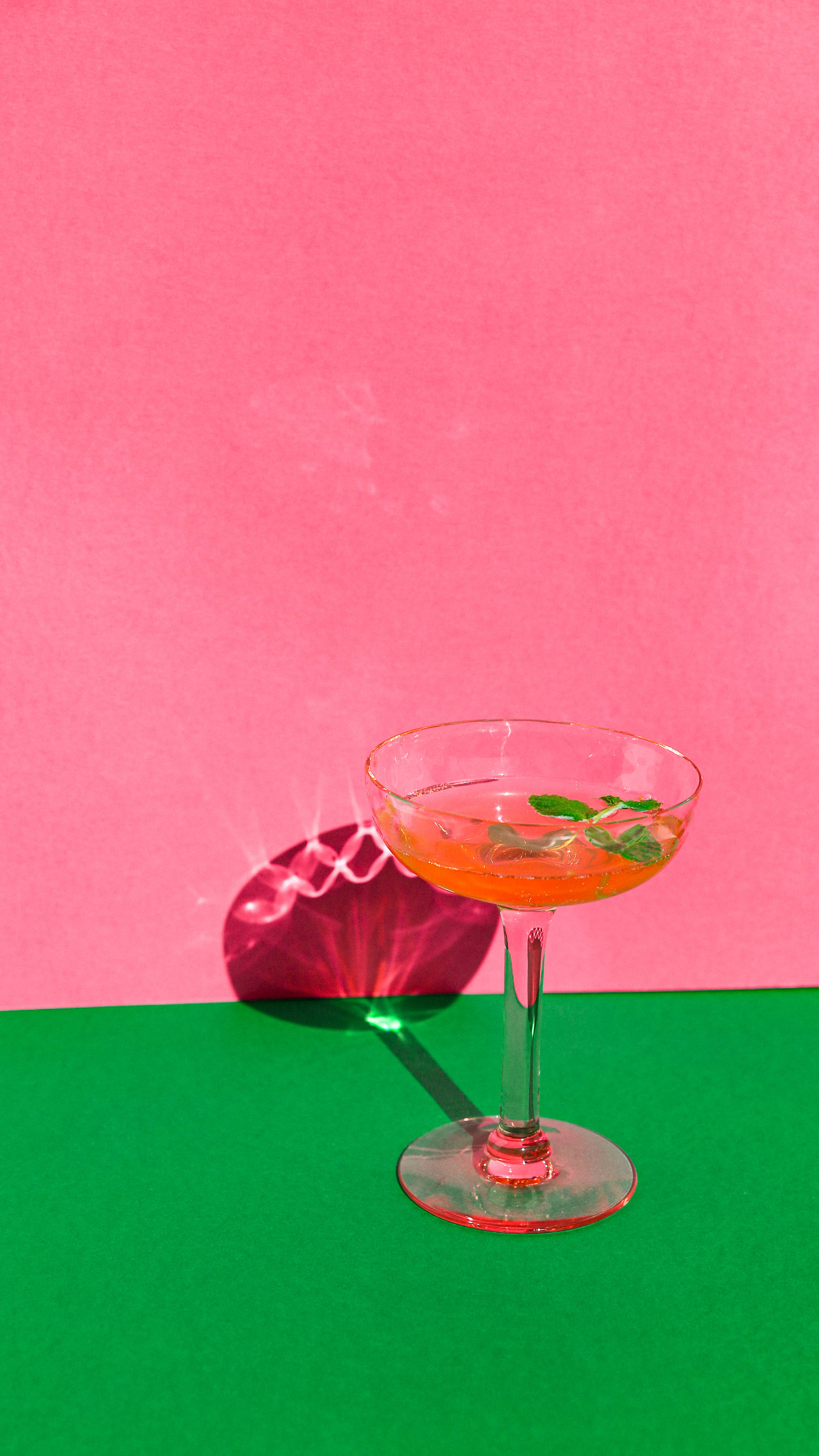 Pink Girl iPhone, coupe glass, vibrant orange cocktail, 2K Phone Wallpaper