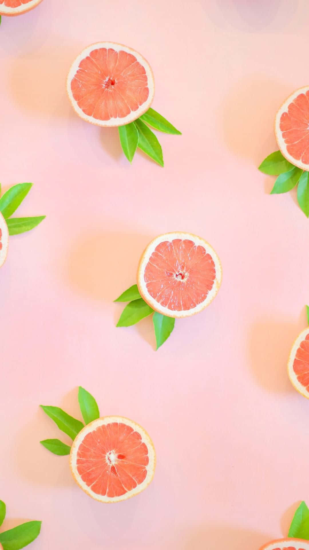 Pink Grapefruit, sliced grapefruits, green leaves, Full HD Phone Wallpaper