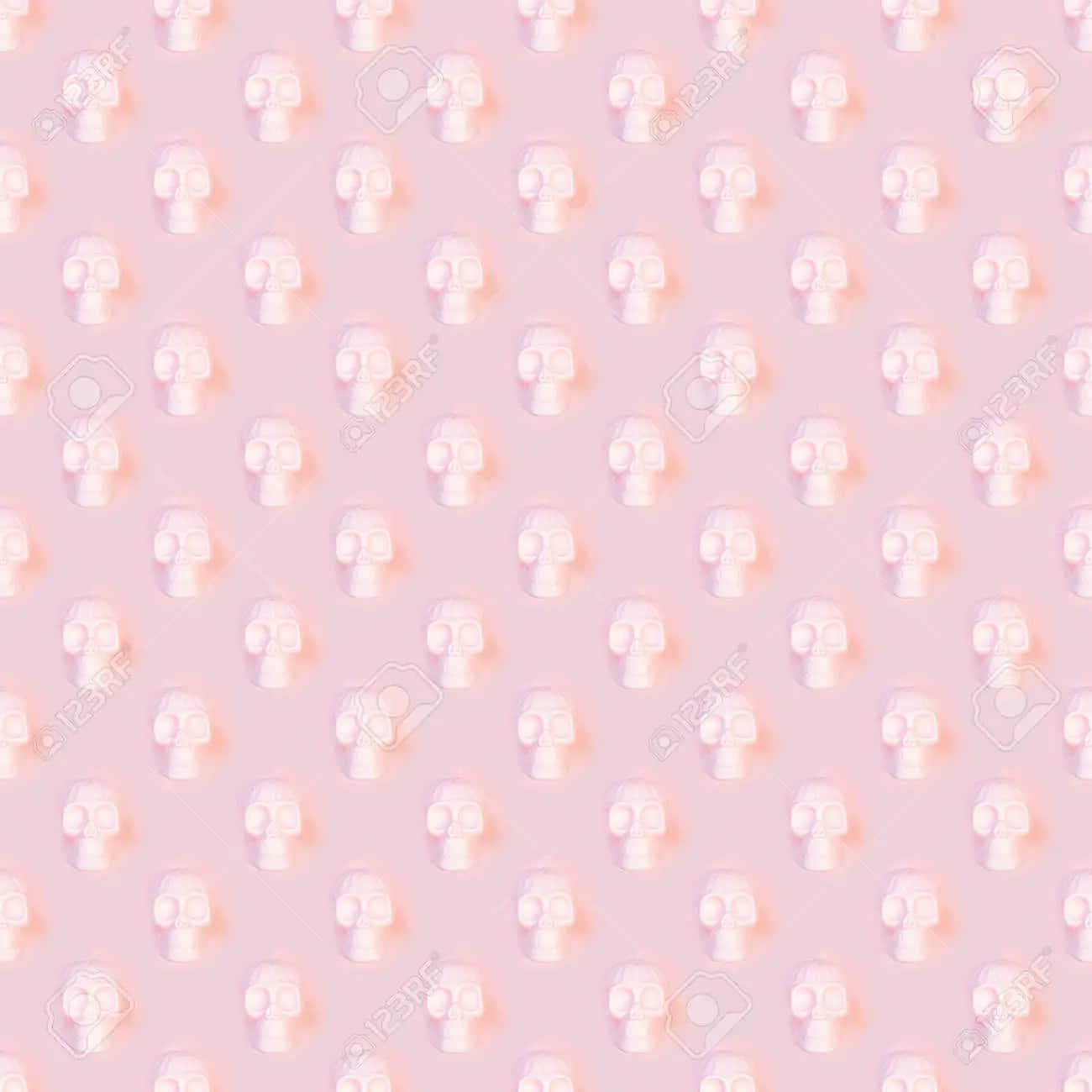 pastel pink background, soft peach glow, stylized white skulls, HD Desktop Wallpaper