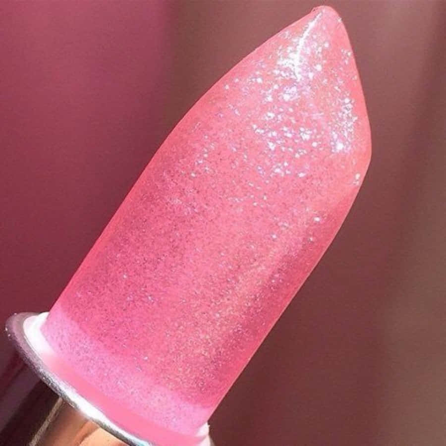pink glitter lipstick, metallic cap, blurred maroon background, SD Desktop Wallpaper