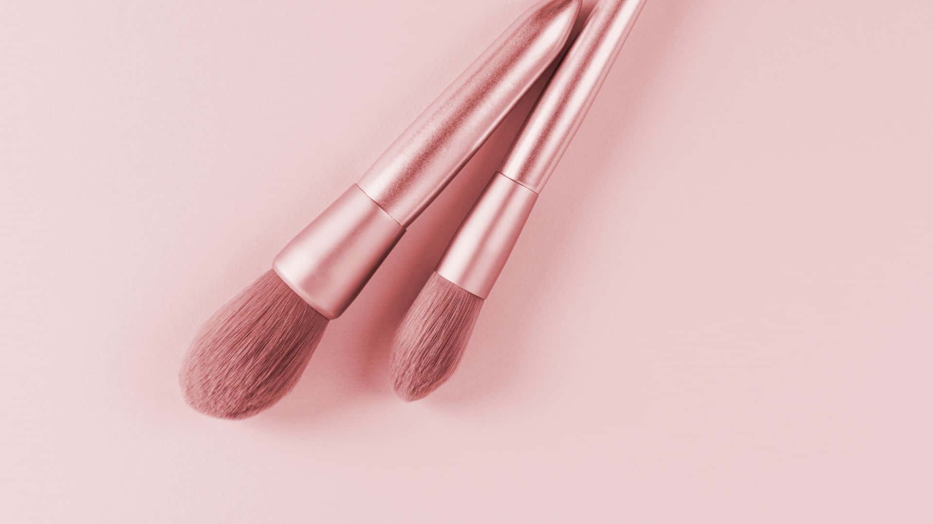 rose gold makeup brushes, soft pink background, gentle shadows, Full HD Desktop Wallpaper