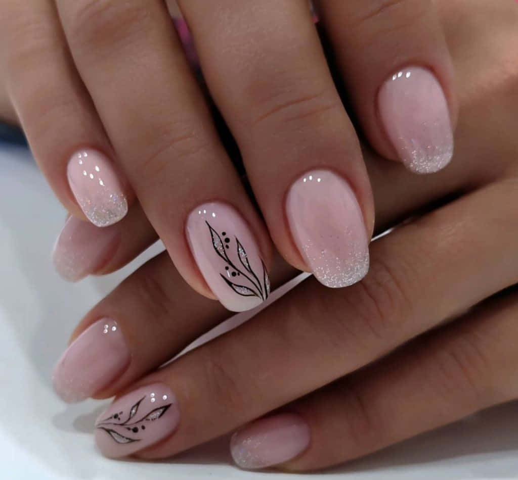 soft pink glitter nails, delicate black leaf designs, close-up of hands, SD Desktop Wallpaper
