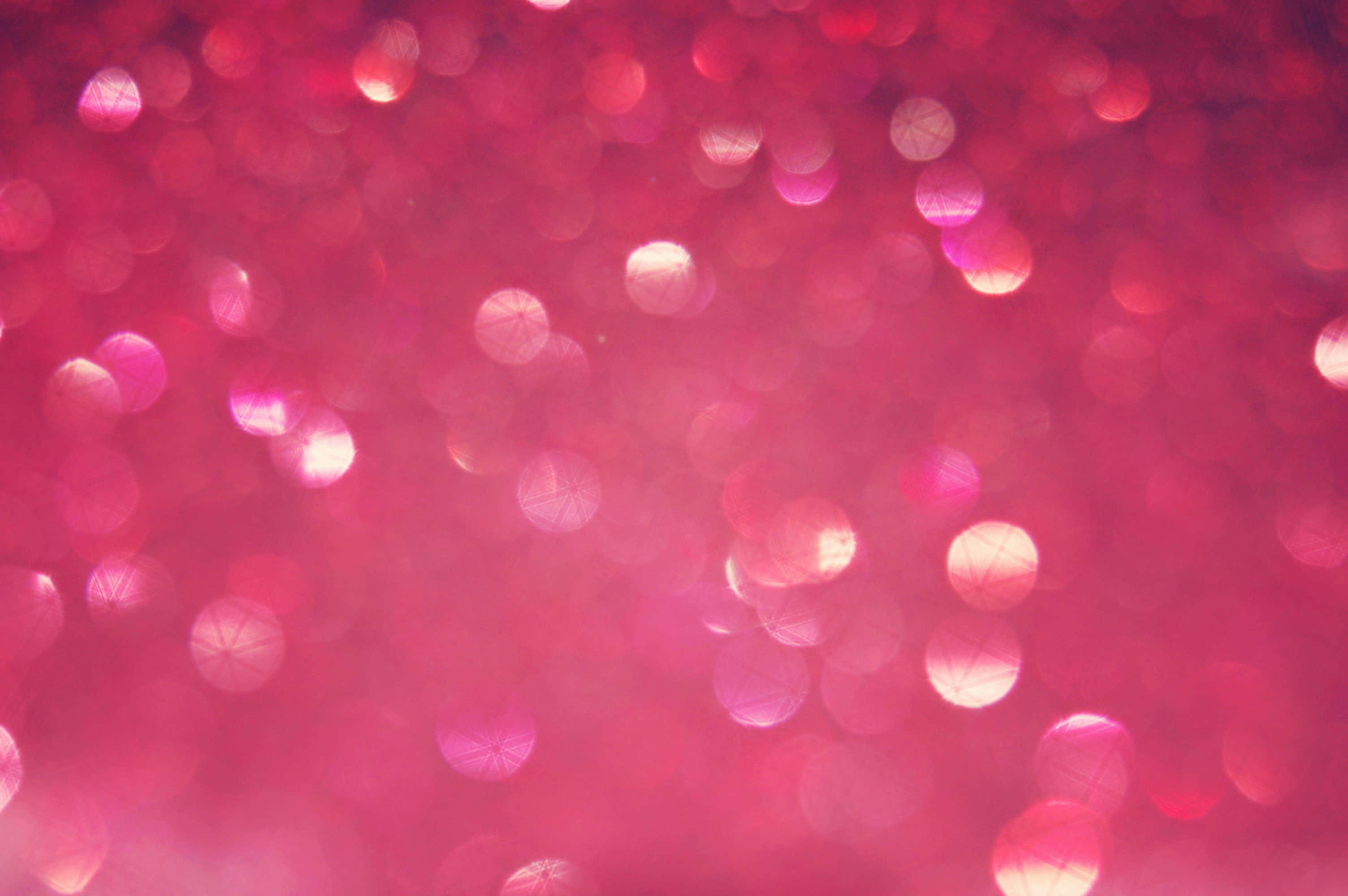 Pink Sparkles, soft pink bokeh lights, glowing circular highlights, 2K Desktop Wallpaper