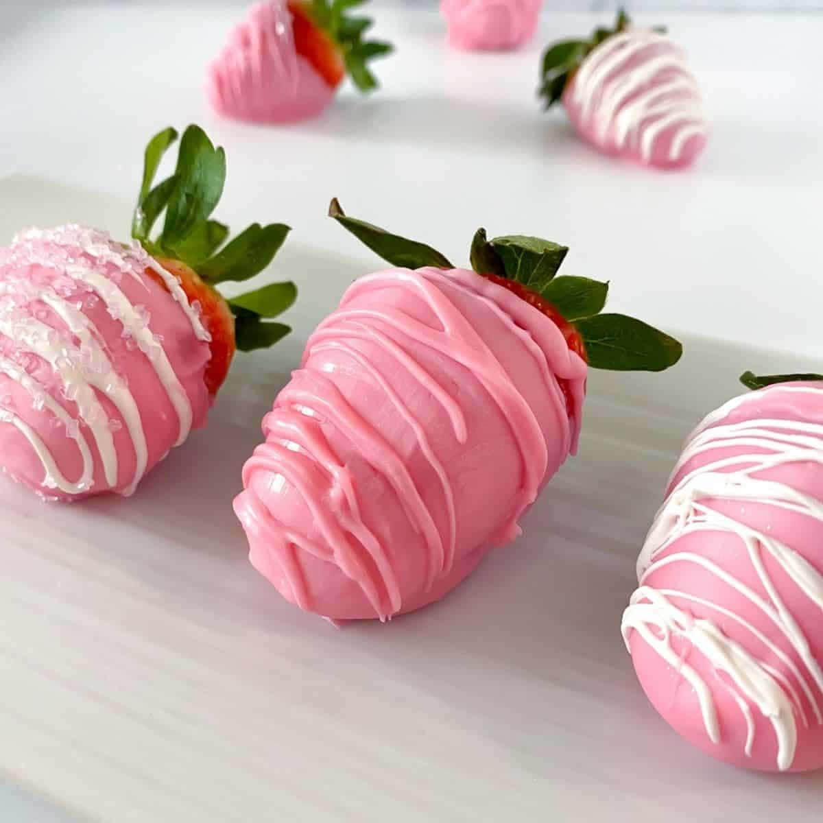 Pink Chocolate Covered Strawberries, white drizzle, green tops, SD Desktop Wallpaper