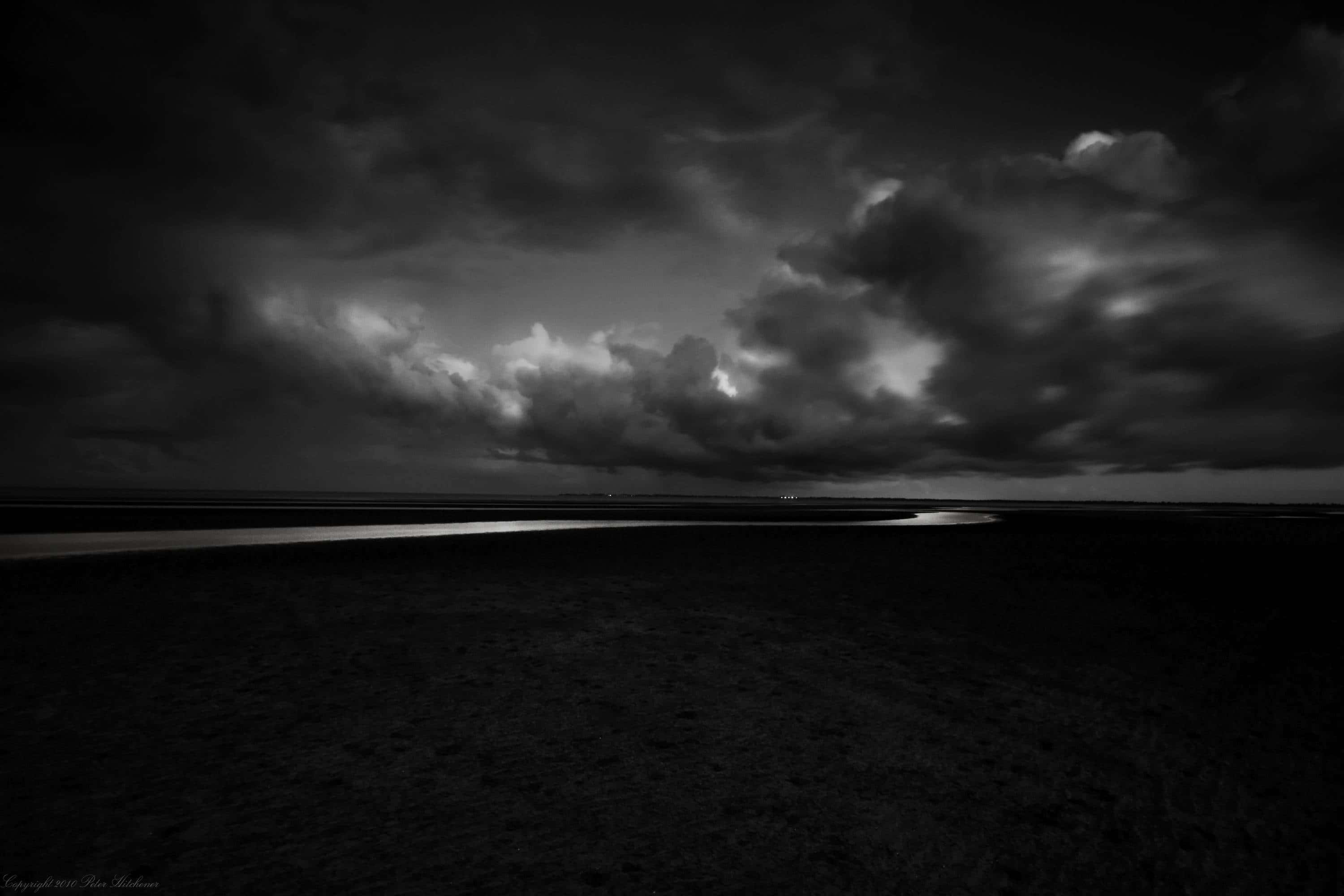black and white cloud, pitch-black sky, dramatic monochrome landscape, 2K Desktop Wallpaper