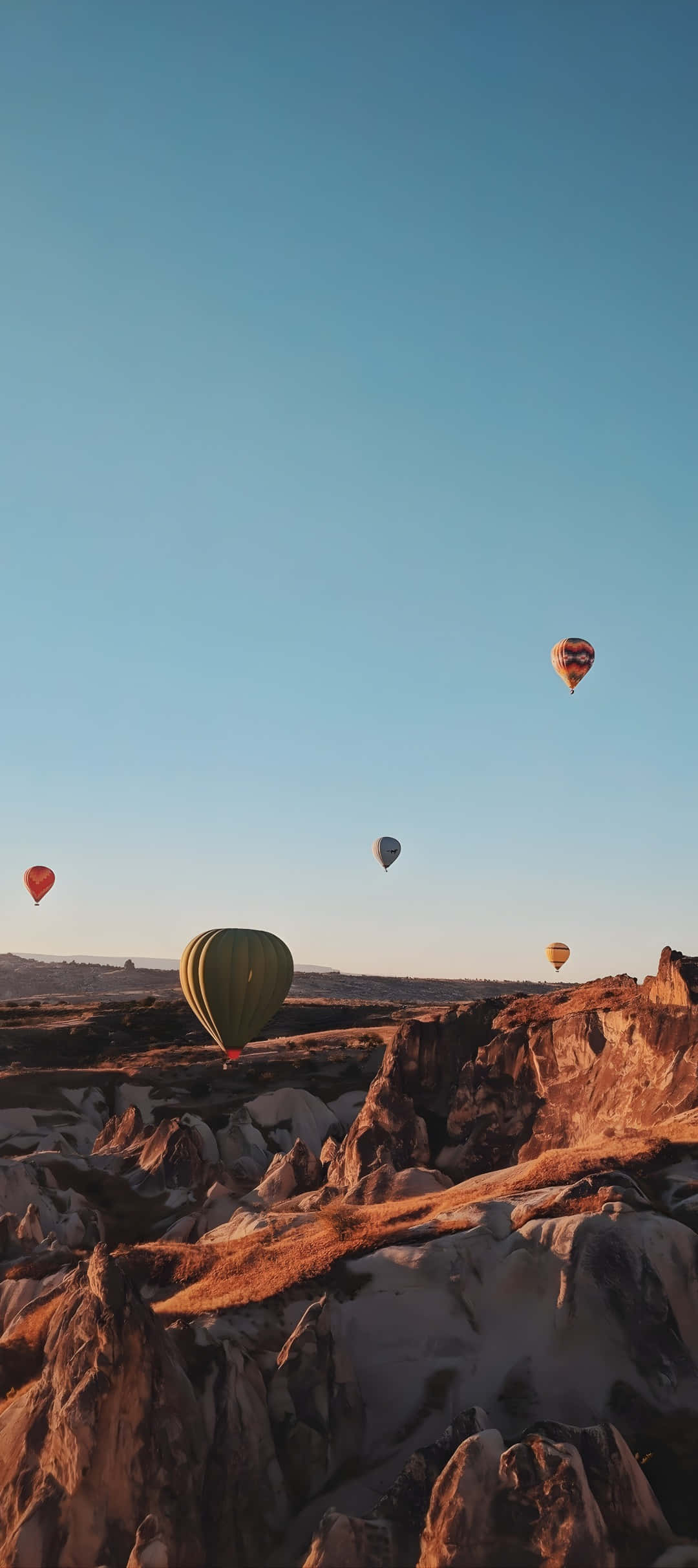 Pixel 9, hot air balloons, rugged orange rock formations, Full HD Phone Wallpaper