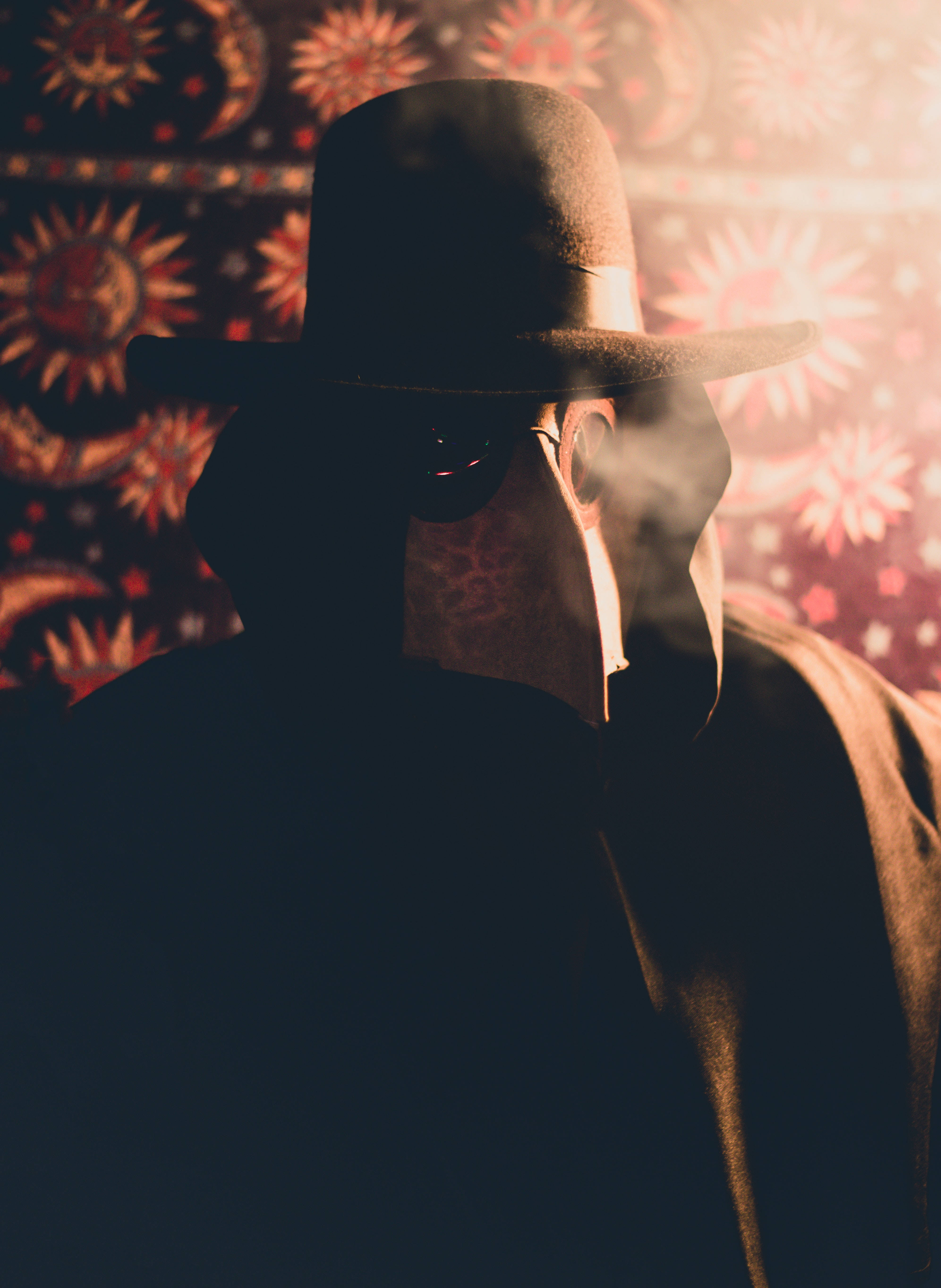 plague doctor mask, ominous beaked mask, vibrant patterned backdrop, 5K Phone Wallpaper