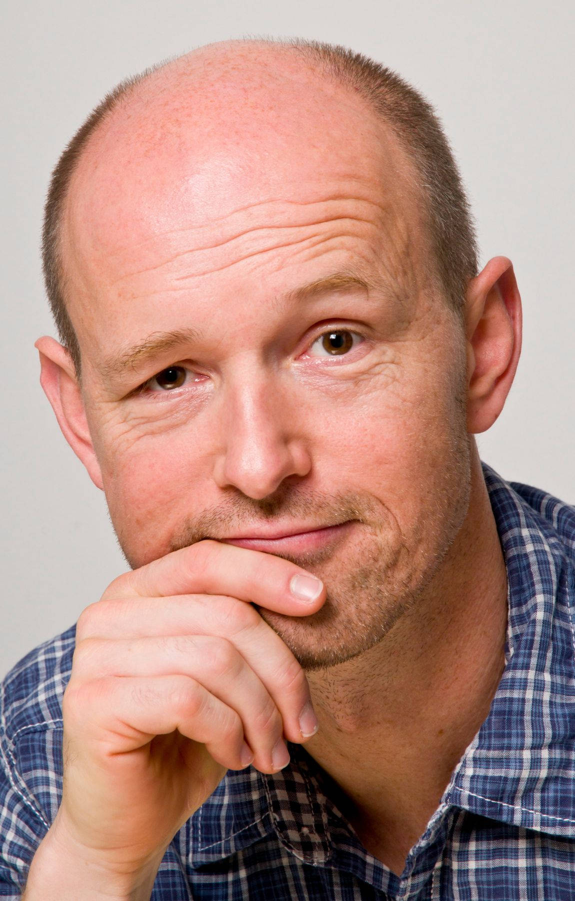 bald man, blue plaid shirt, thoughtful expression, HD Phone Wallpaper