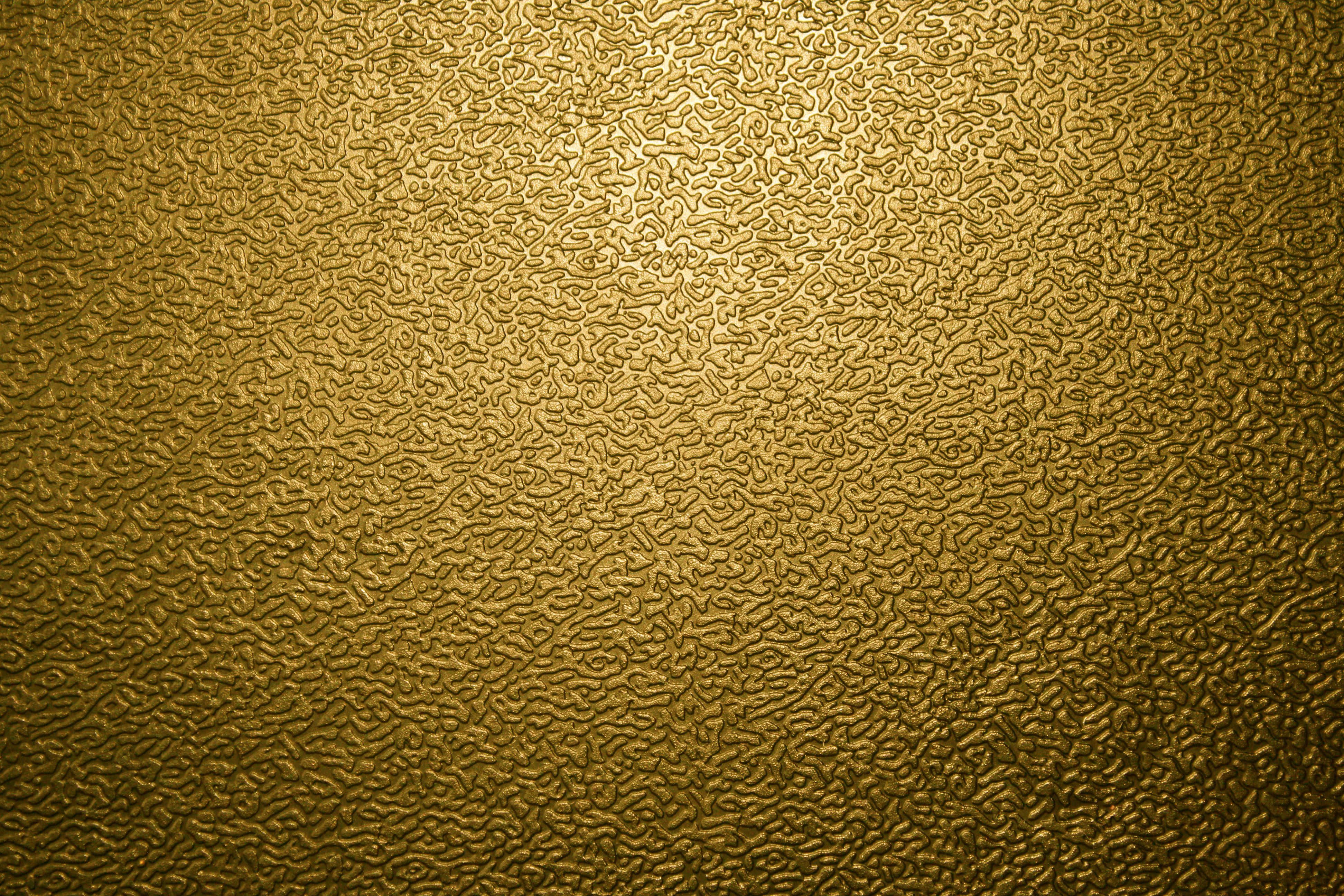 metallic gold, golden textured surface, swirling embossed patterns, 4K Desktop Wallpaper