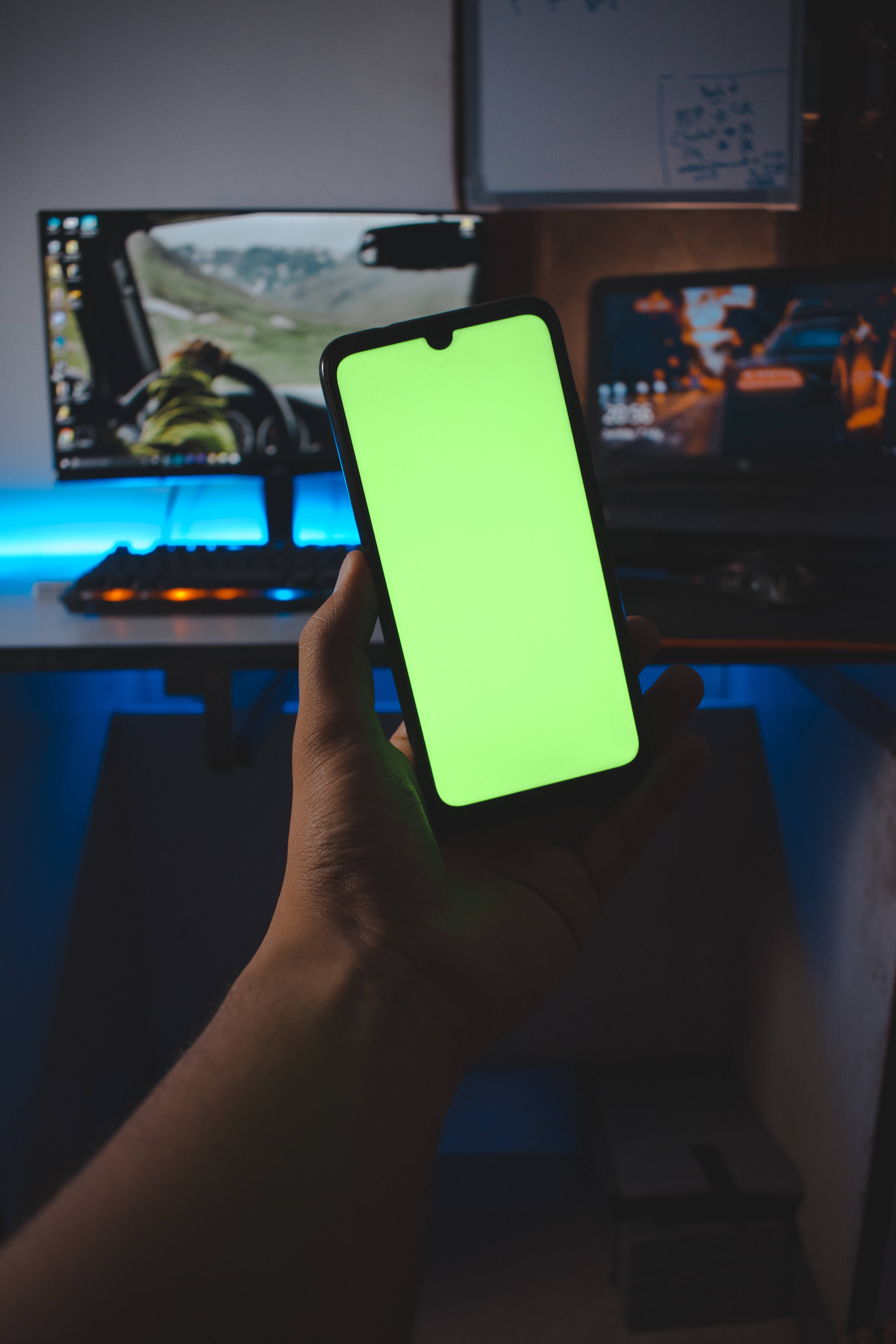 green screen, phone, dimly lit gaming setup, 5K Phone Wallpaper