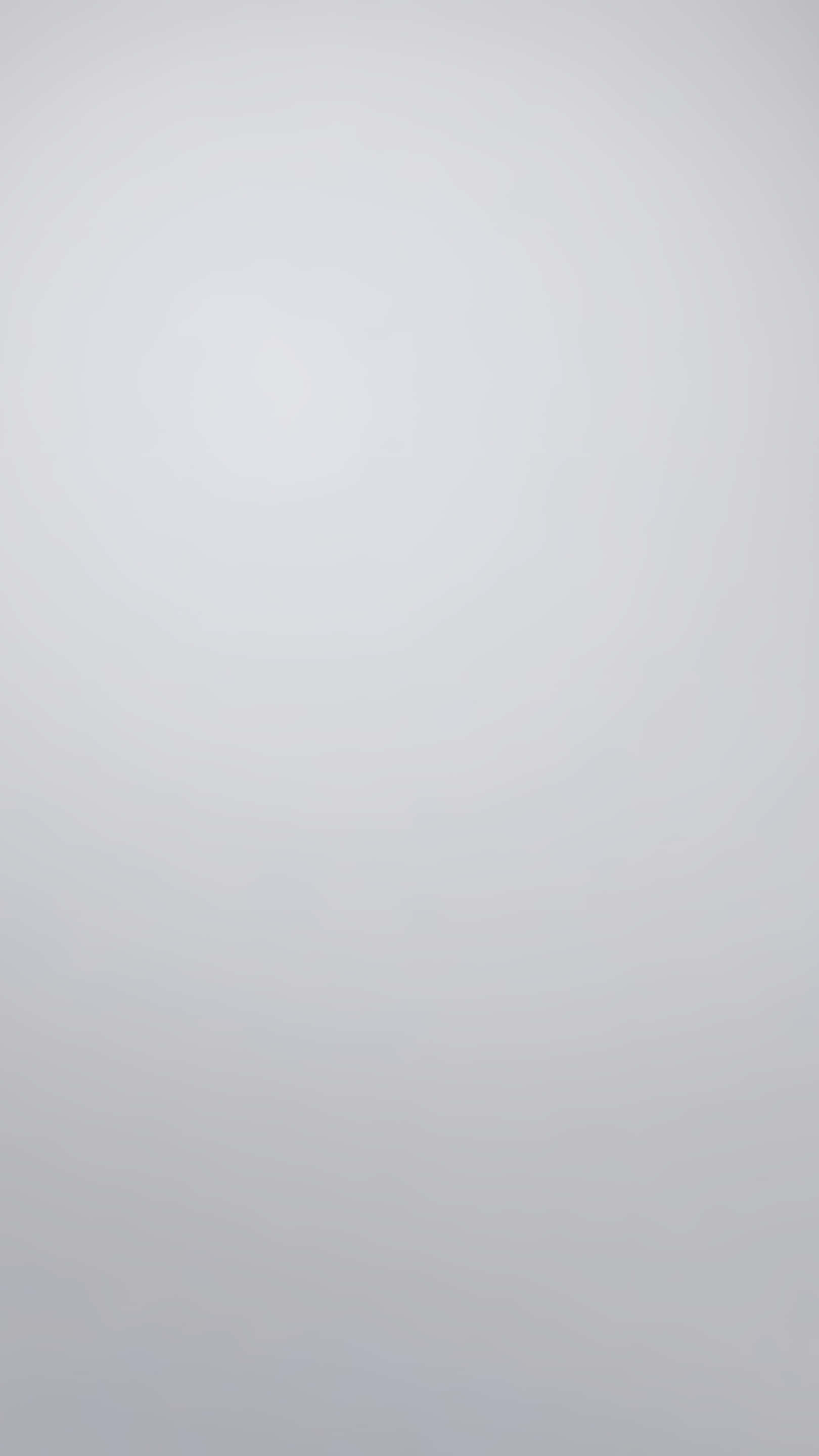 clean minimalist grey gradient texture, pale gray tones, gentle luminous center, 2K Phone Wallpaper