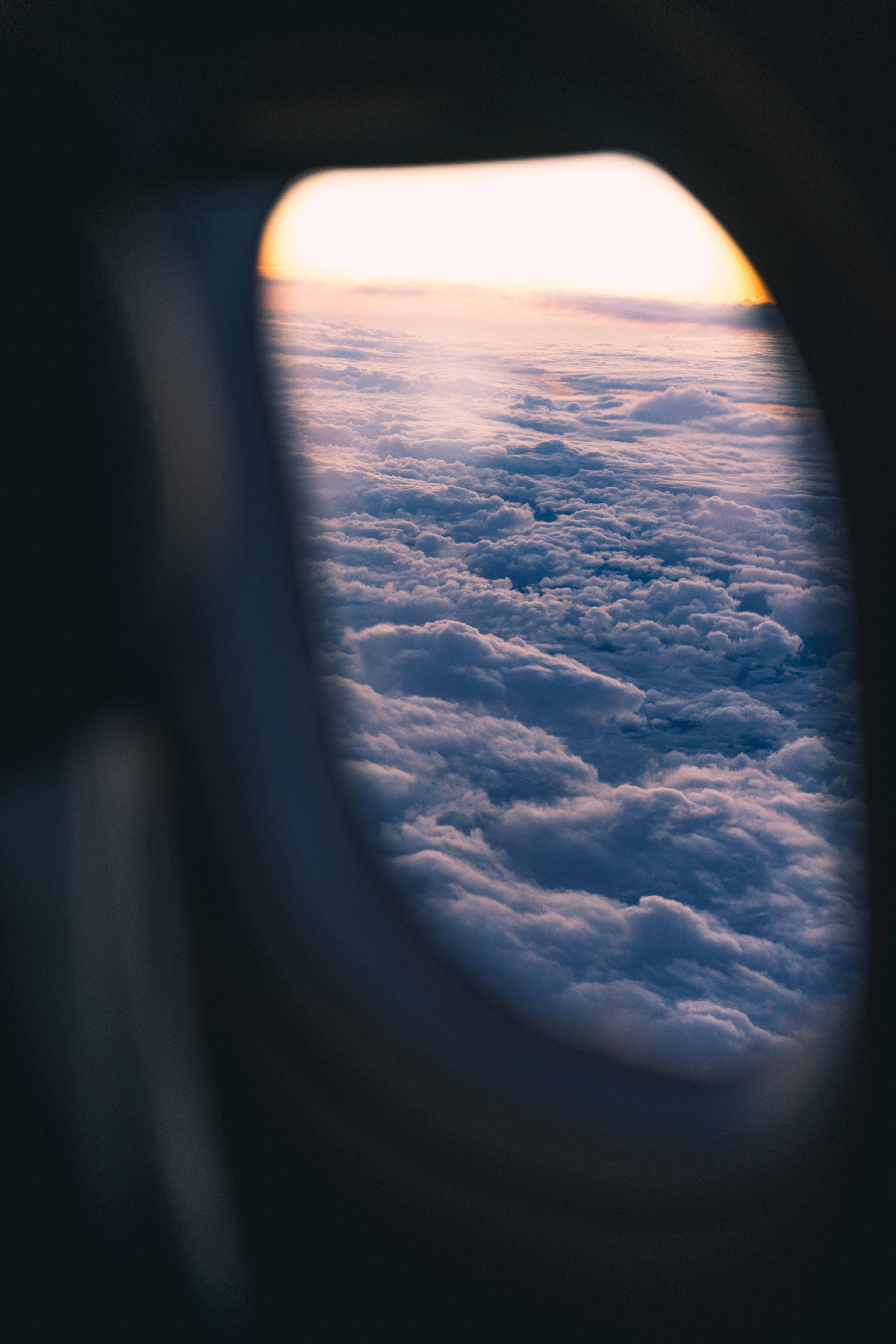 sunrise, airplane window, soft blue and white clouds, 5K Phone Wallpaper