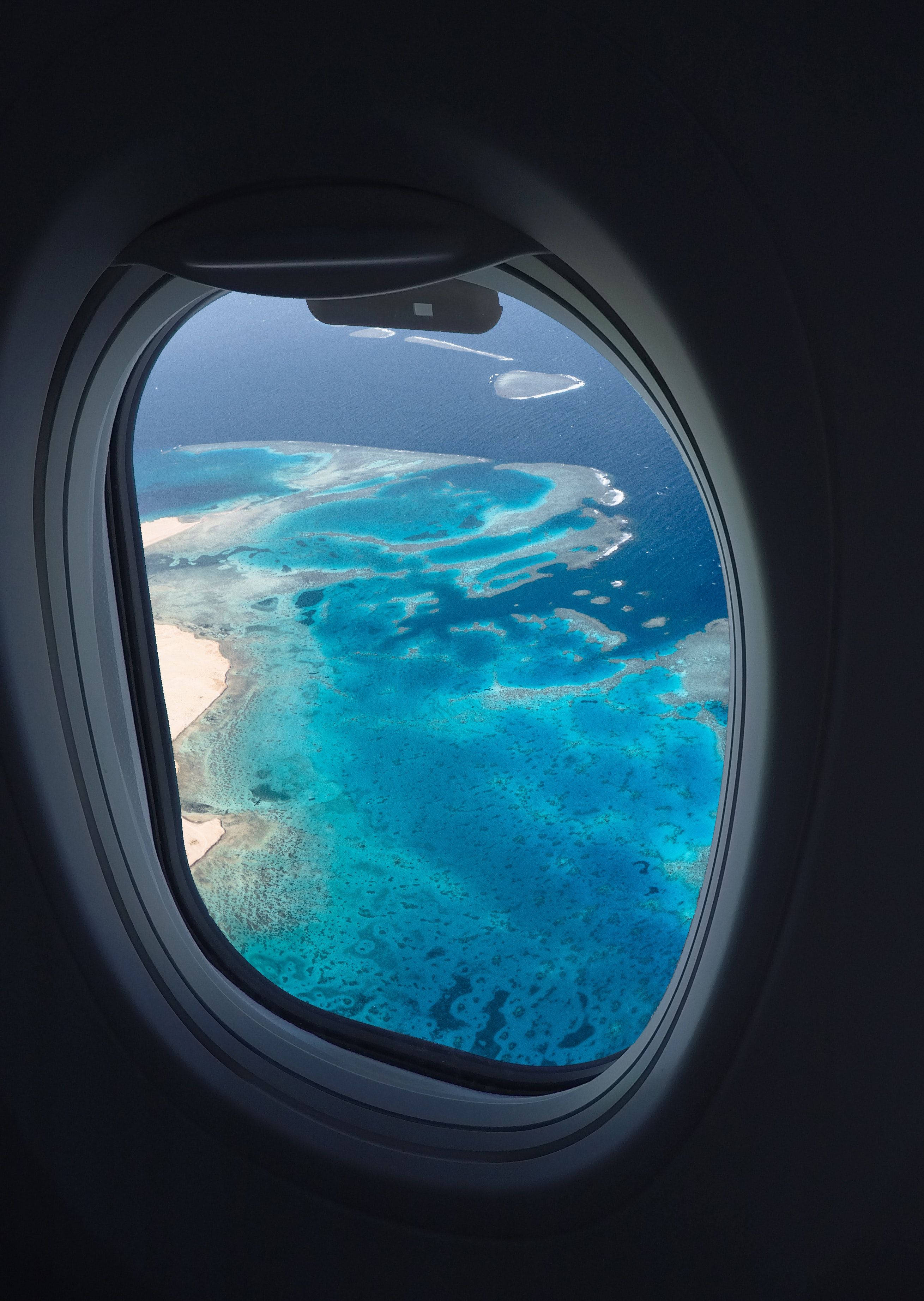 plane window, turquoise lagoon, coral reef, 2K Phone Wallpaper