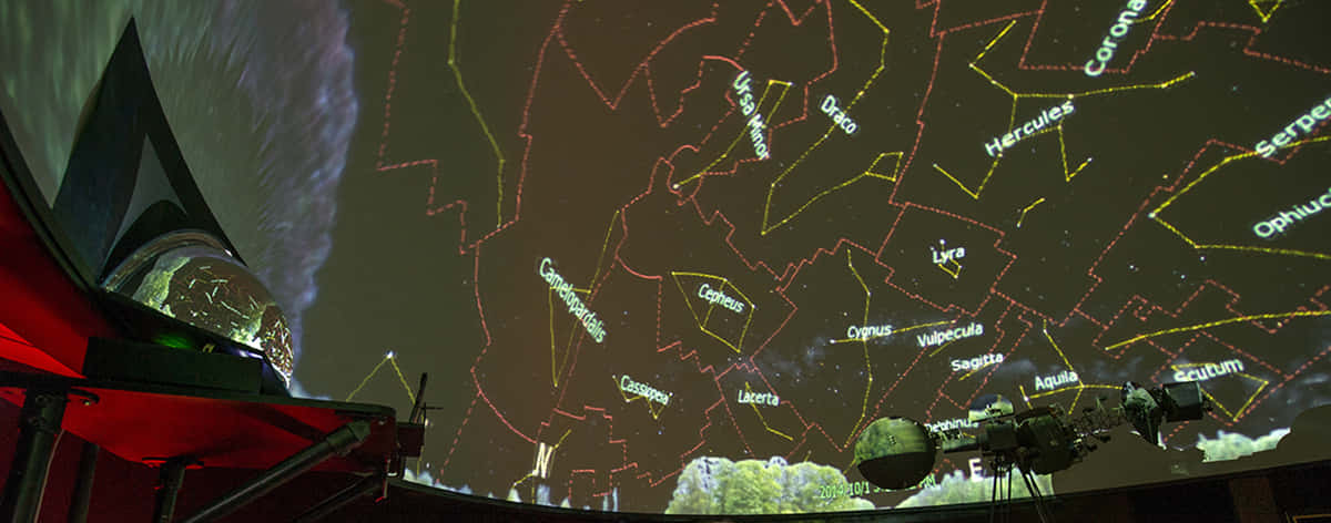 Planetarium, glowing yellow constellation lines, dark starry sky, SD Desktop Wallpaper