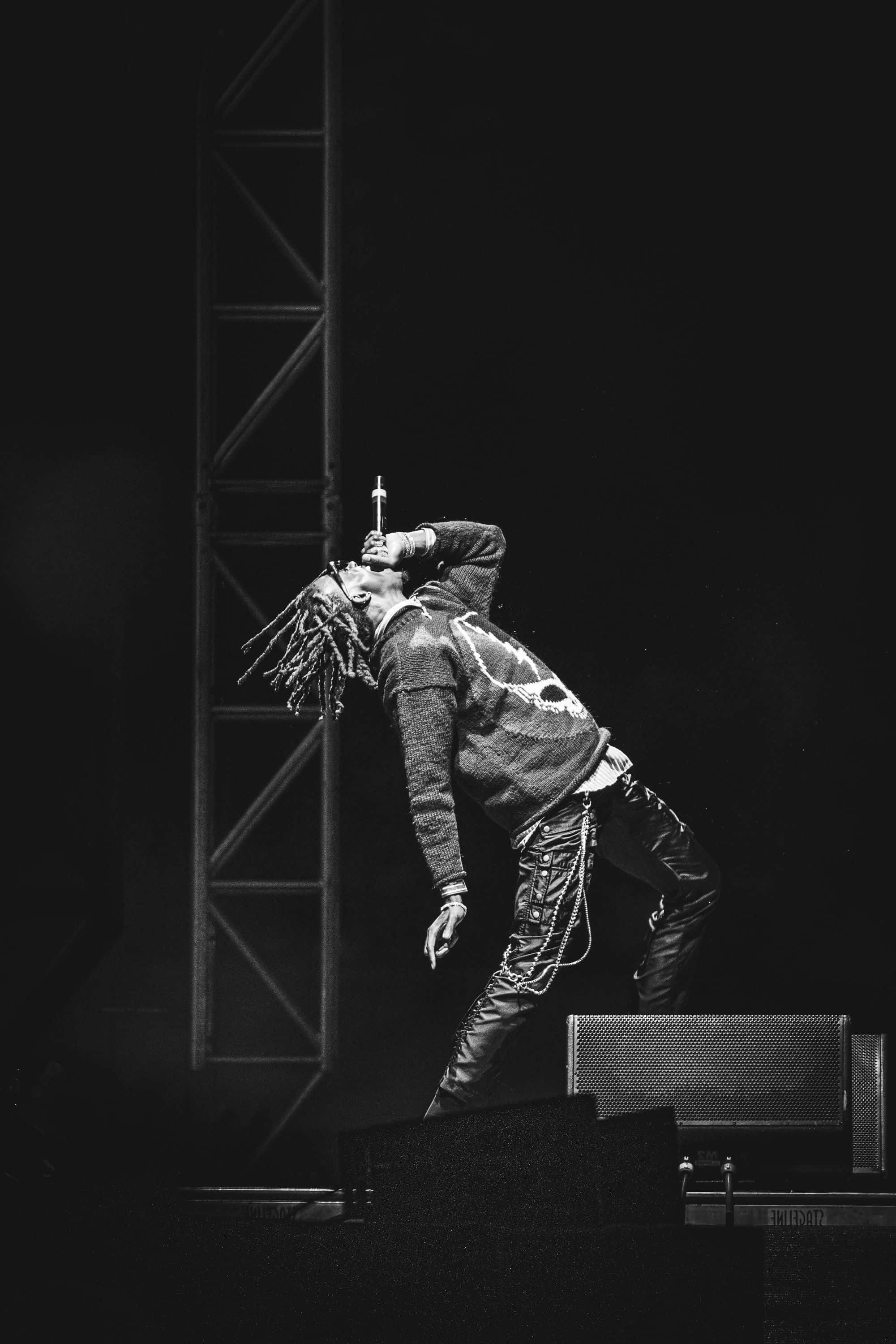 Playboi Carti, dreadlocks, dimly lit stage, 2K Phone Wallpaper