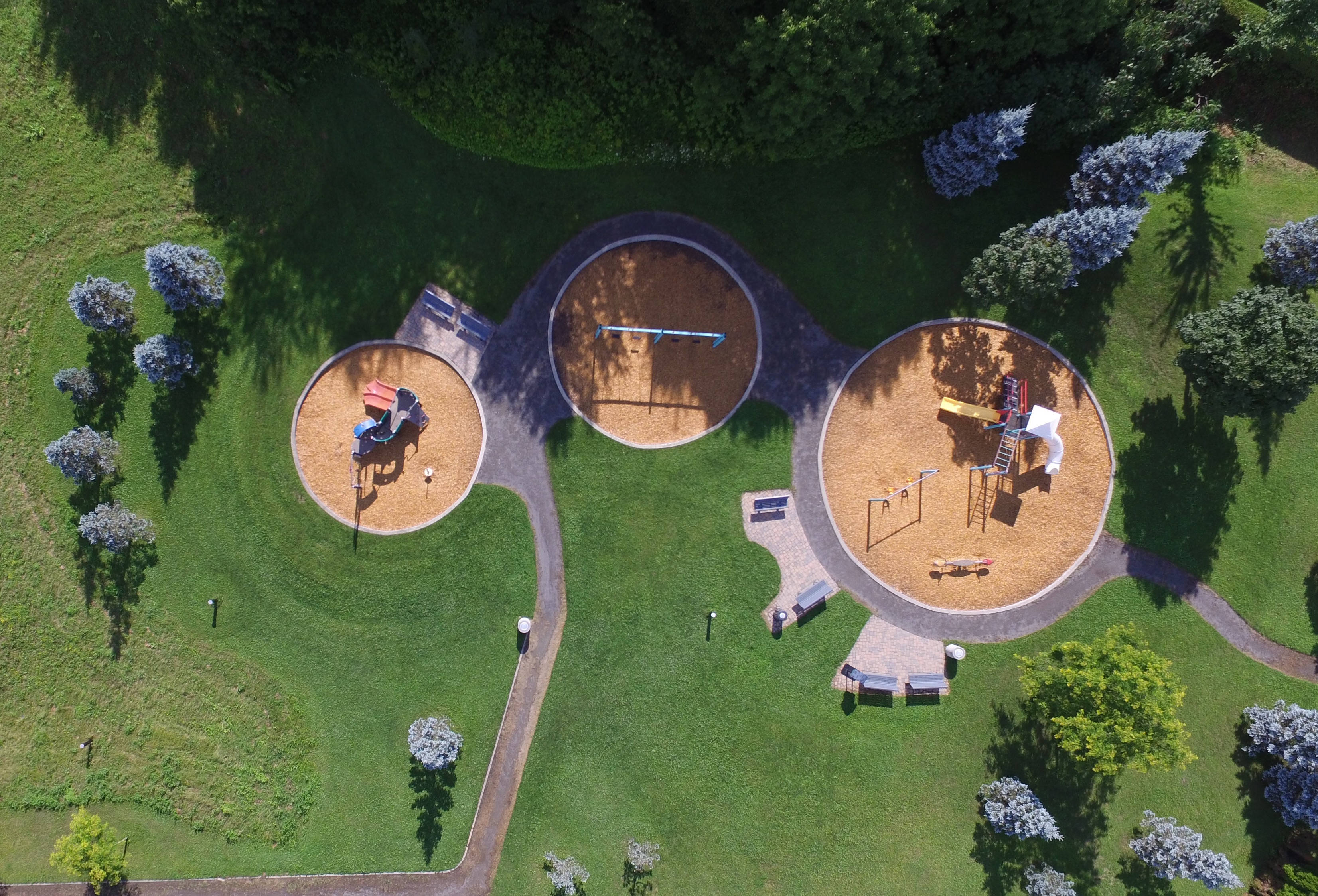 Aerial Round Playground, modern playground, three circular sand pits, 2K Desktop Wallpaper