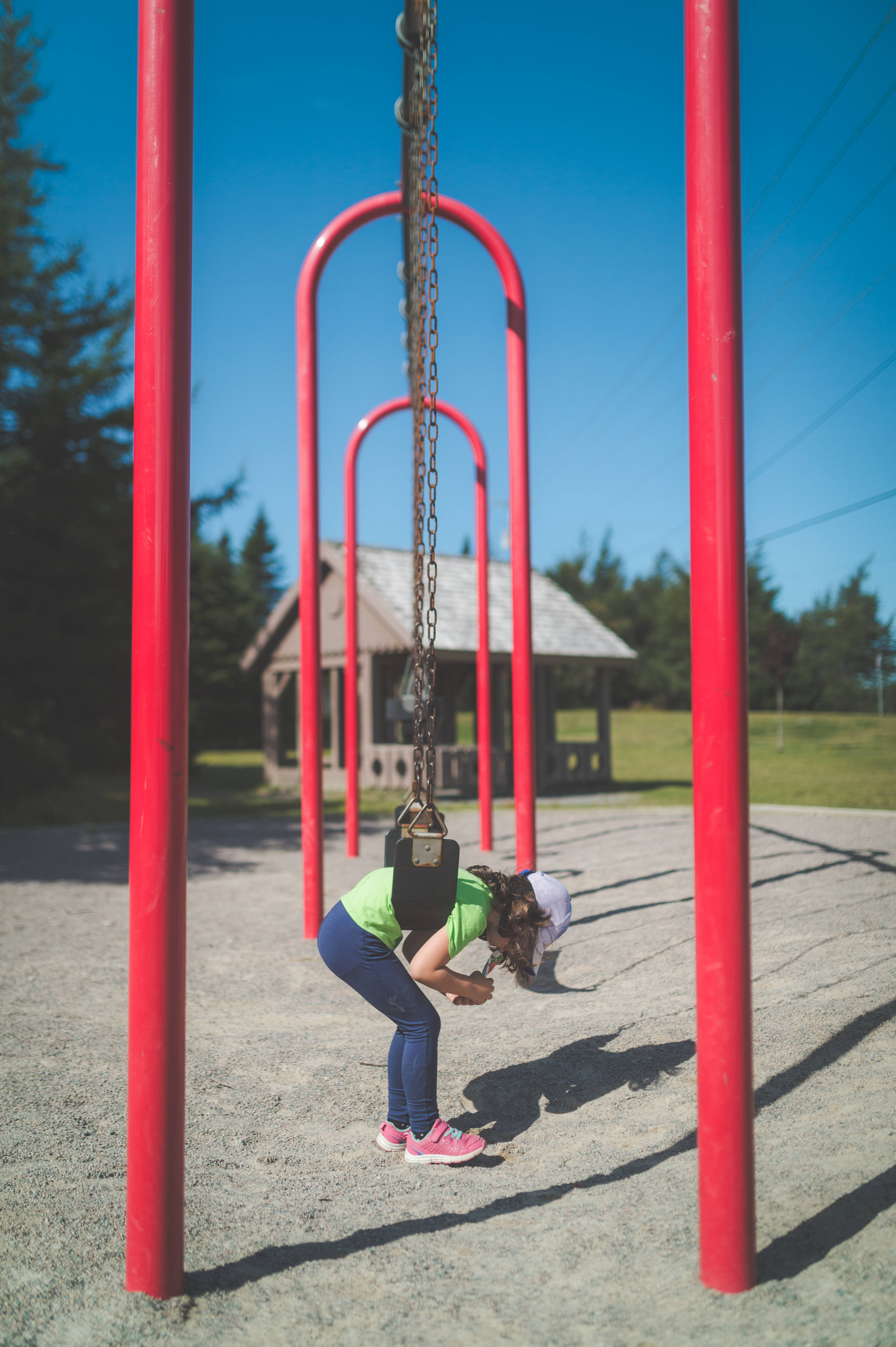 little girl, red swing set, sunny playground, 4K Phone Wallpaper