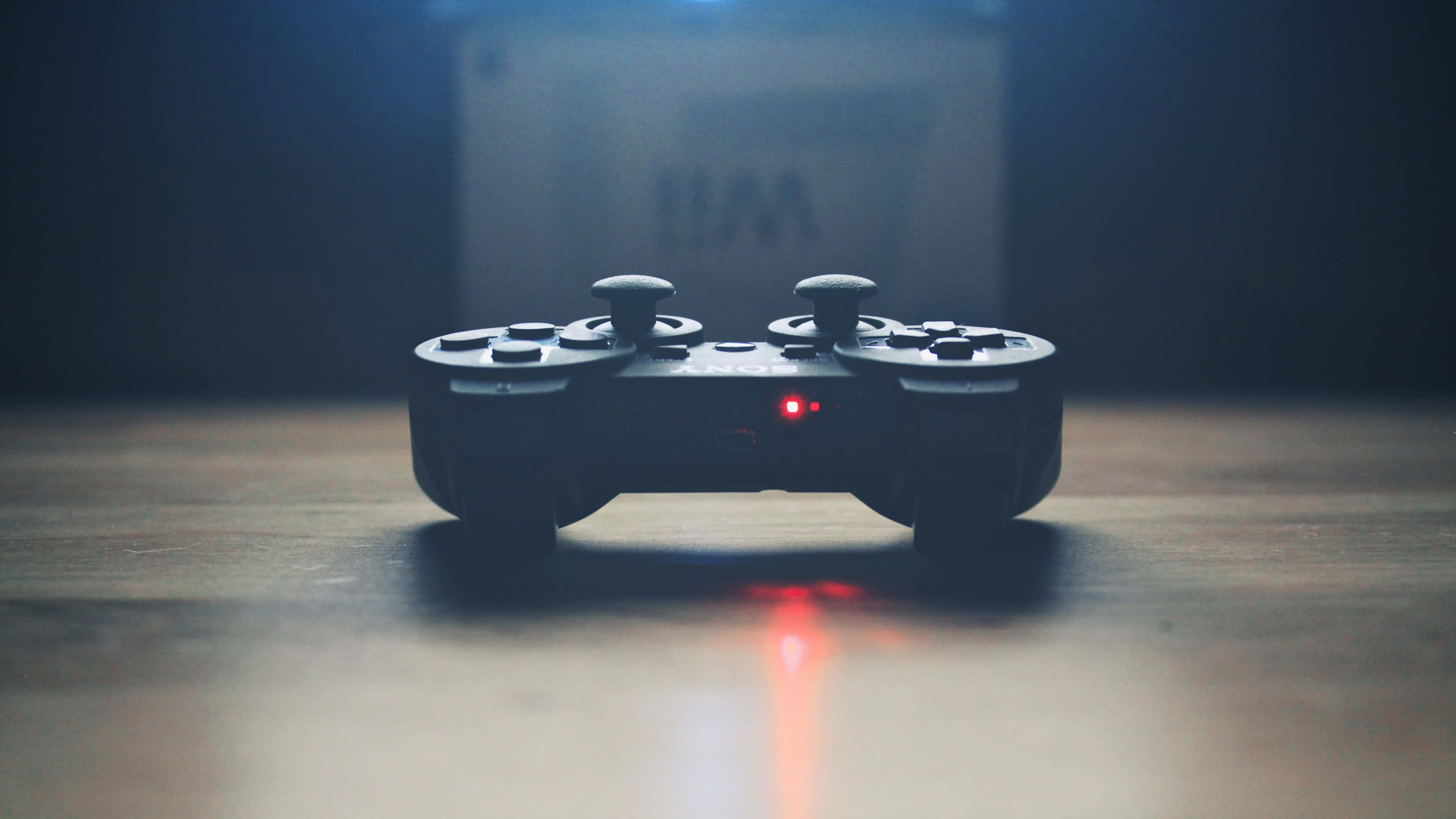 Playstation 4K, black gaming controller, wooden surface, 4K Desktop Wallpaper