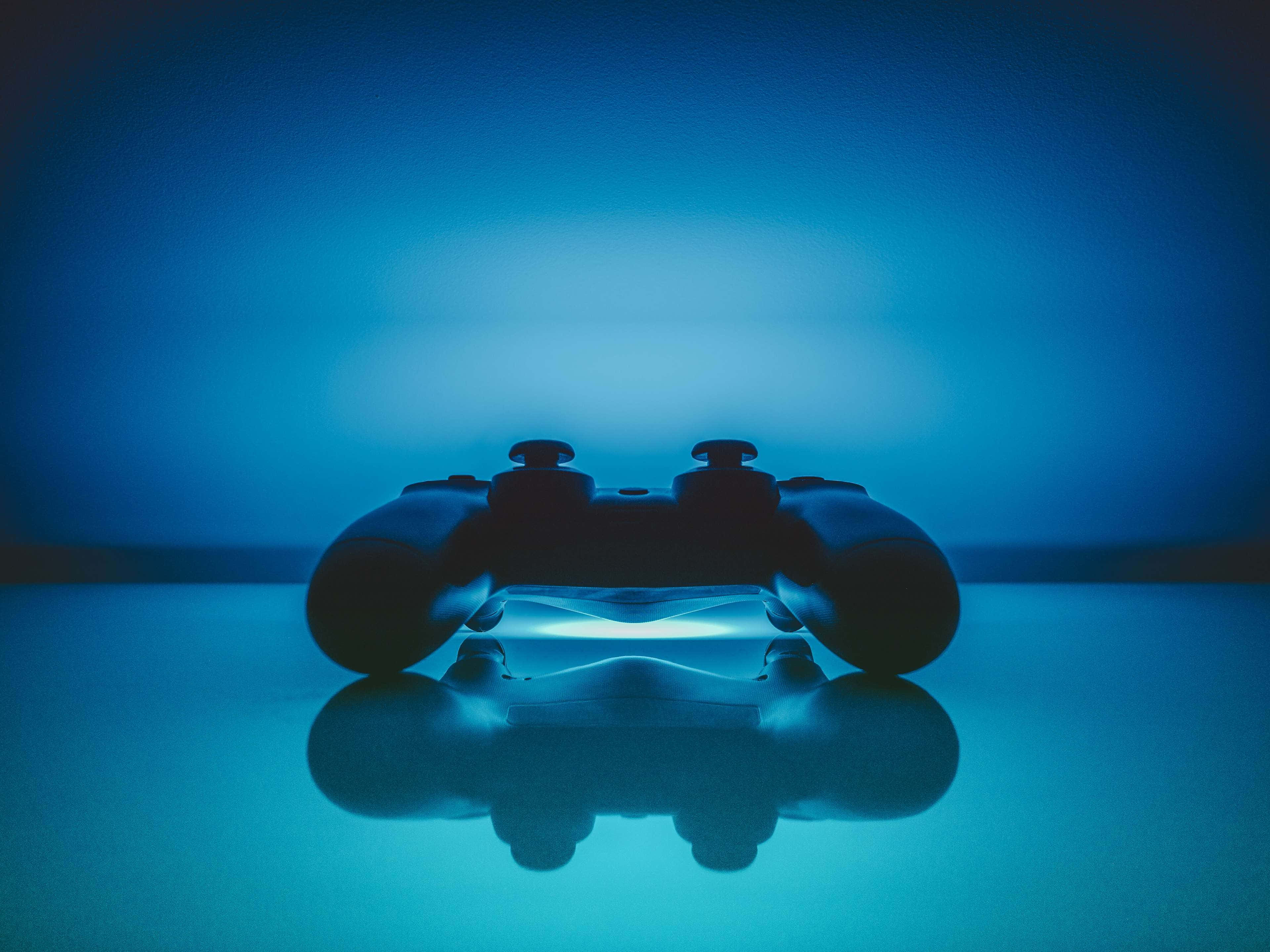 Playstation 4K, gaming controller, cool blue light, 4K Desktop Wallpaper