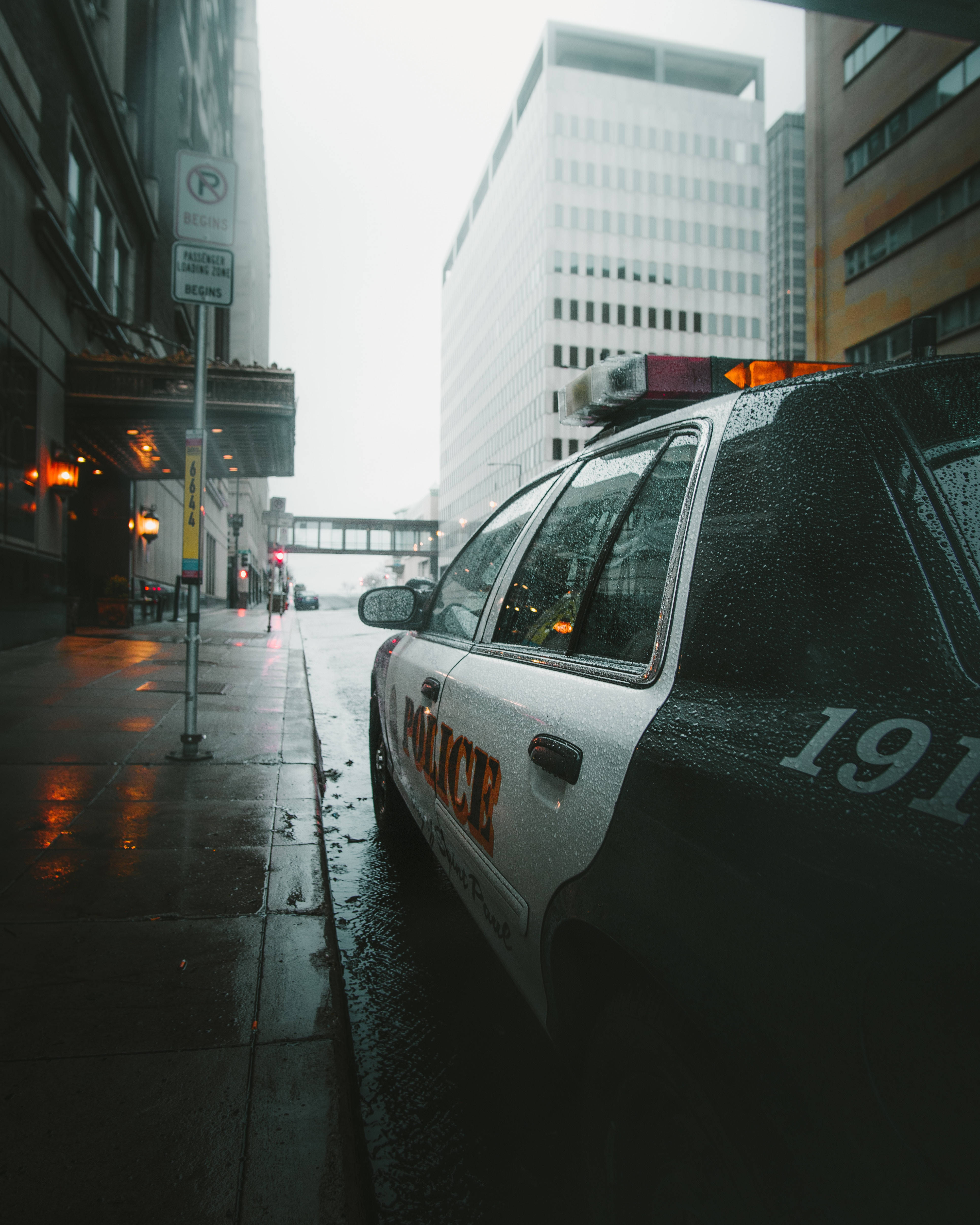 raining city police car, police car, wet city street, 4K Phone Wallpaper