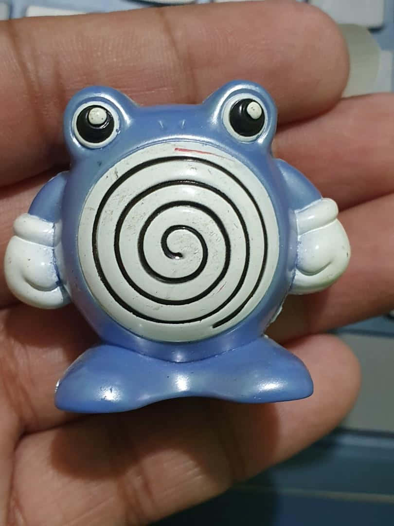 Poliwhirl, blue plastic frog figurine, spiral pattern, SD Phone Wallpaper