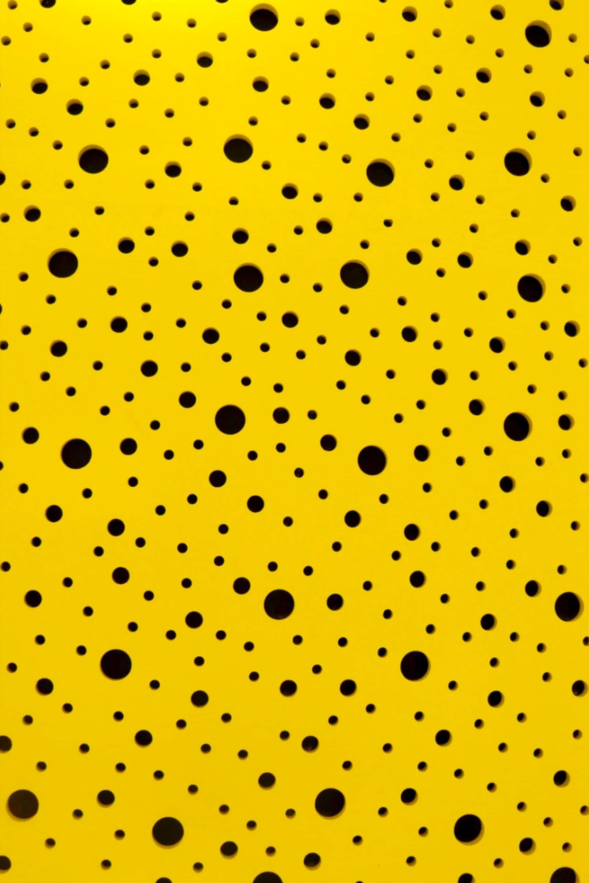 yellow perforated pattern, vibrant yellow, black circular holes, 2K Phone Wallpaper