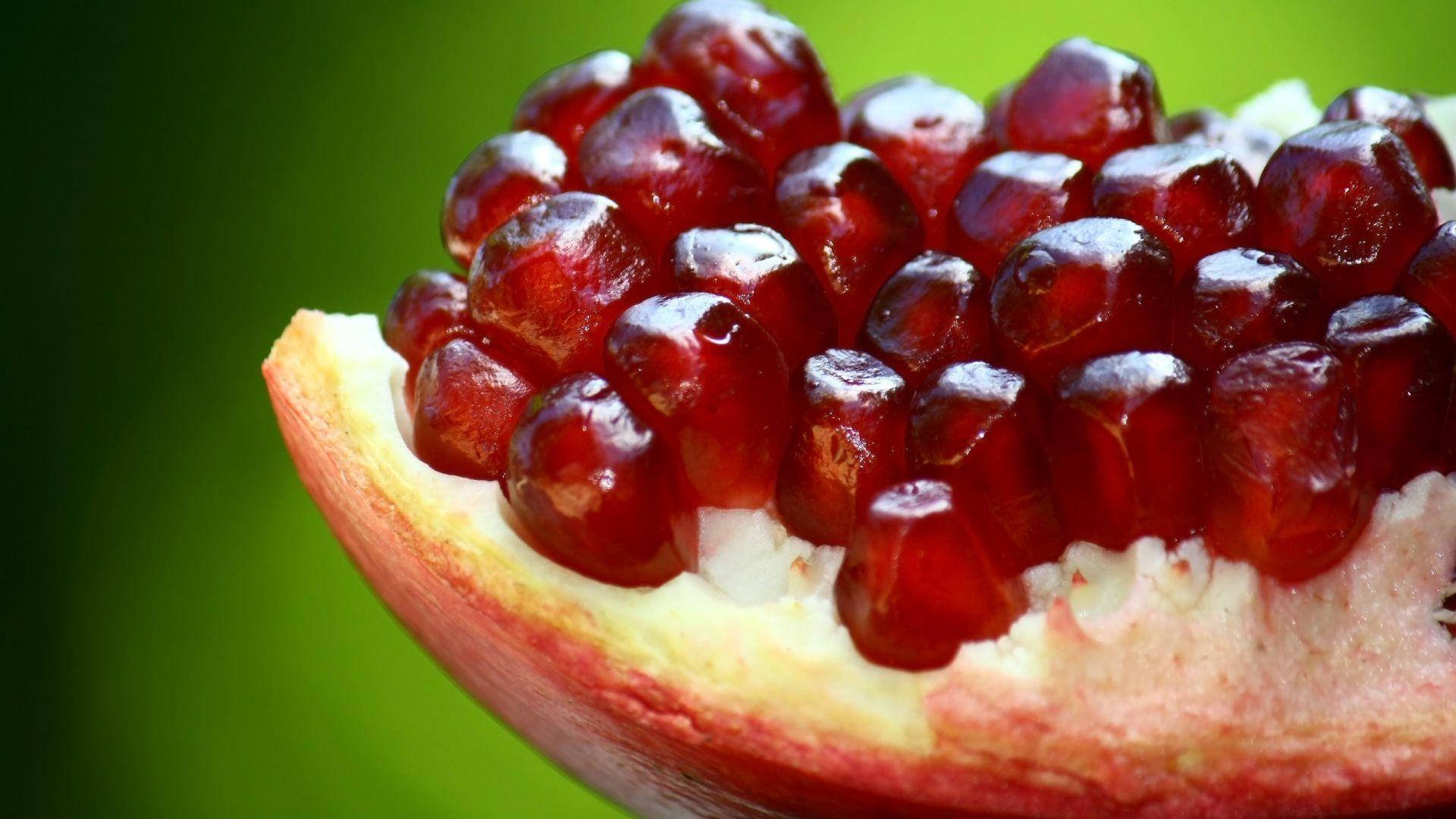 pomegranate fruits, ruby-red pomegranate arils, soft green background, Full HD Desktop Wallpaper