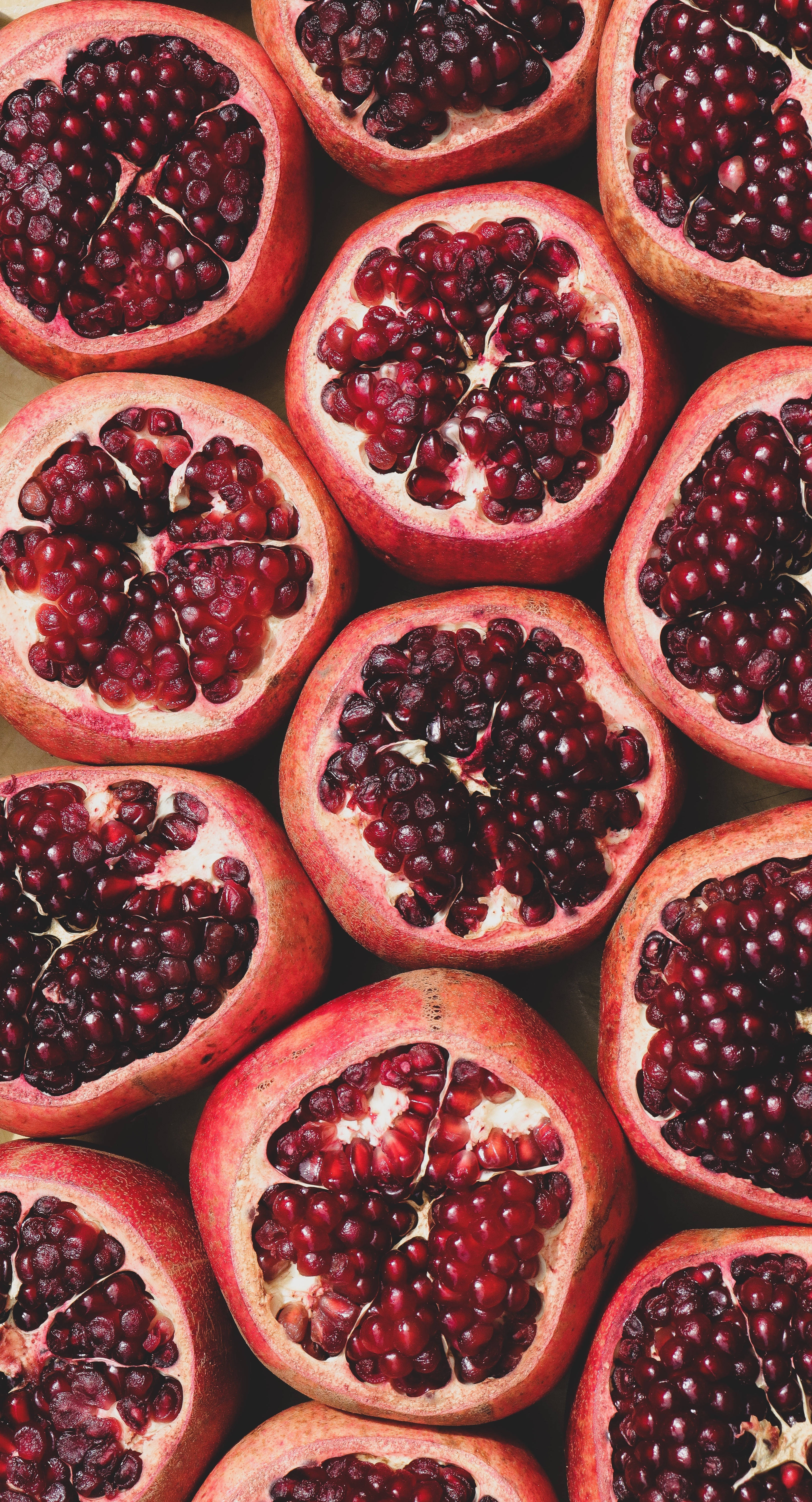 ripe red pomegranate fruit, ruby-red arils, pinkish-red rinds, 5K Phone Wallpaper