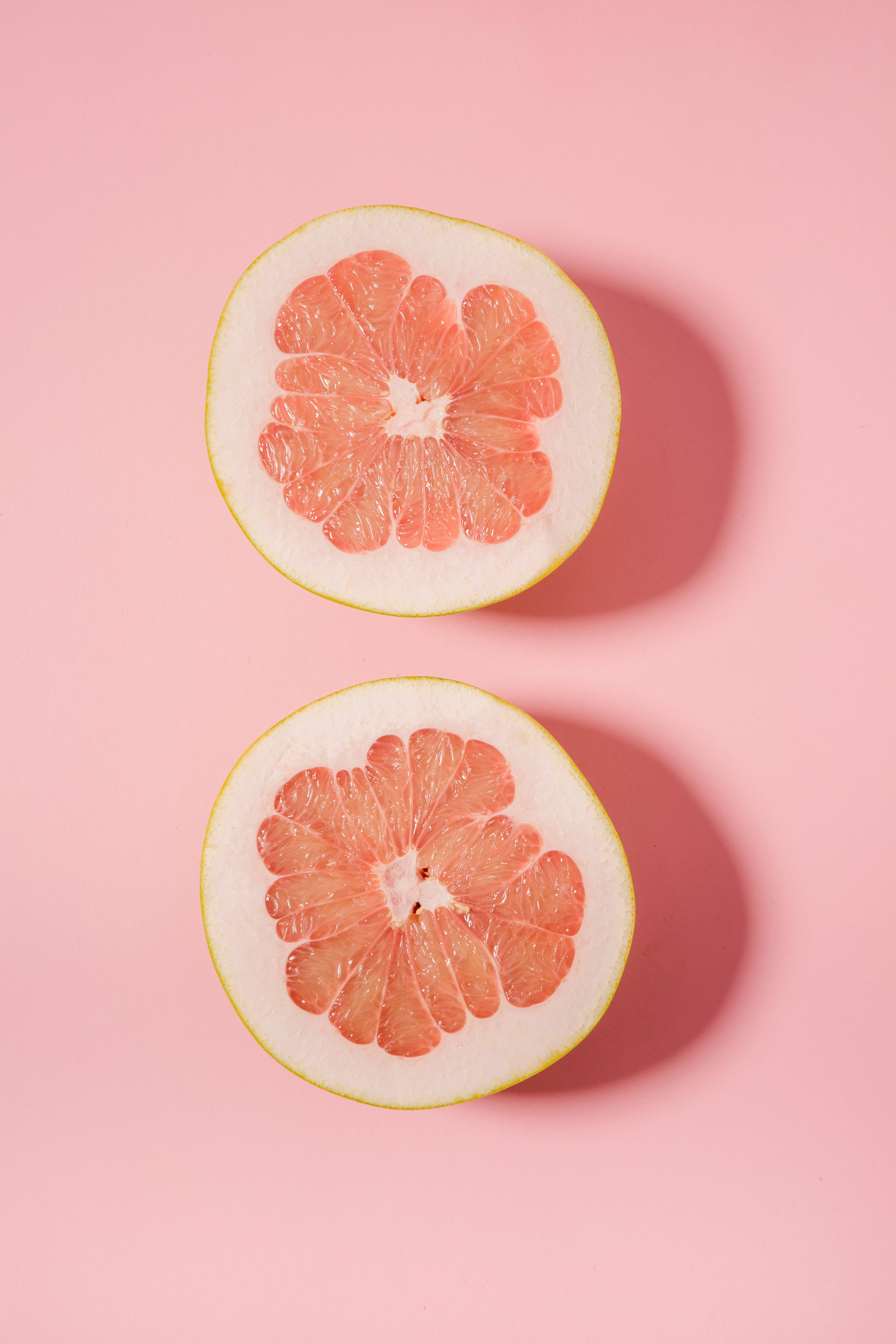 Pomelo Halves, pink grapefruit, juicy segments, 5K Phone Wallpaper