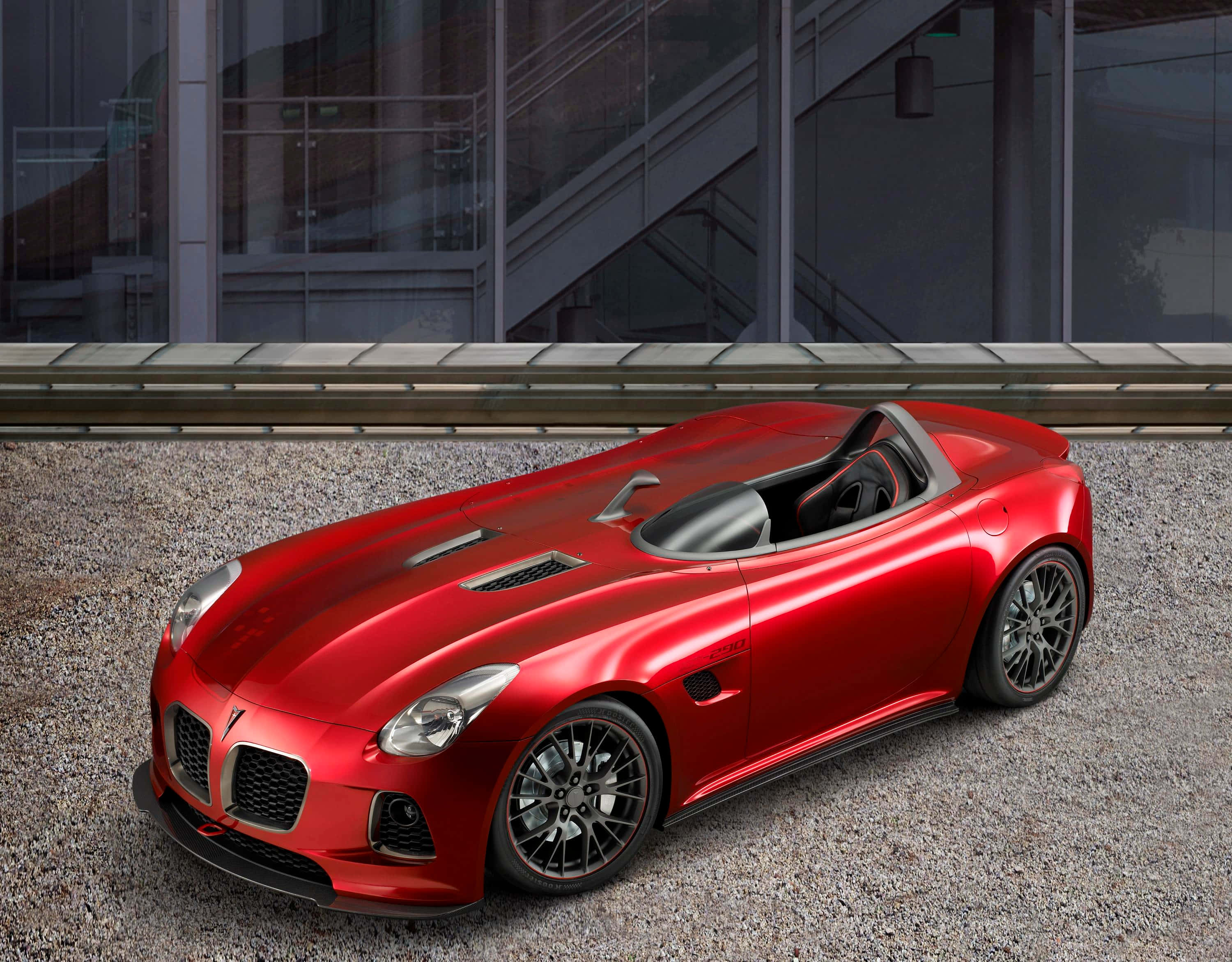 Pontiac Solstice, glossy red, black accents, 2K Desktop Wallpaper