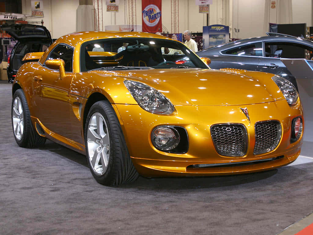 Pontiac Solstice, gold, indoor auto show, SD Desktop Wallpaper