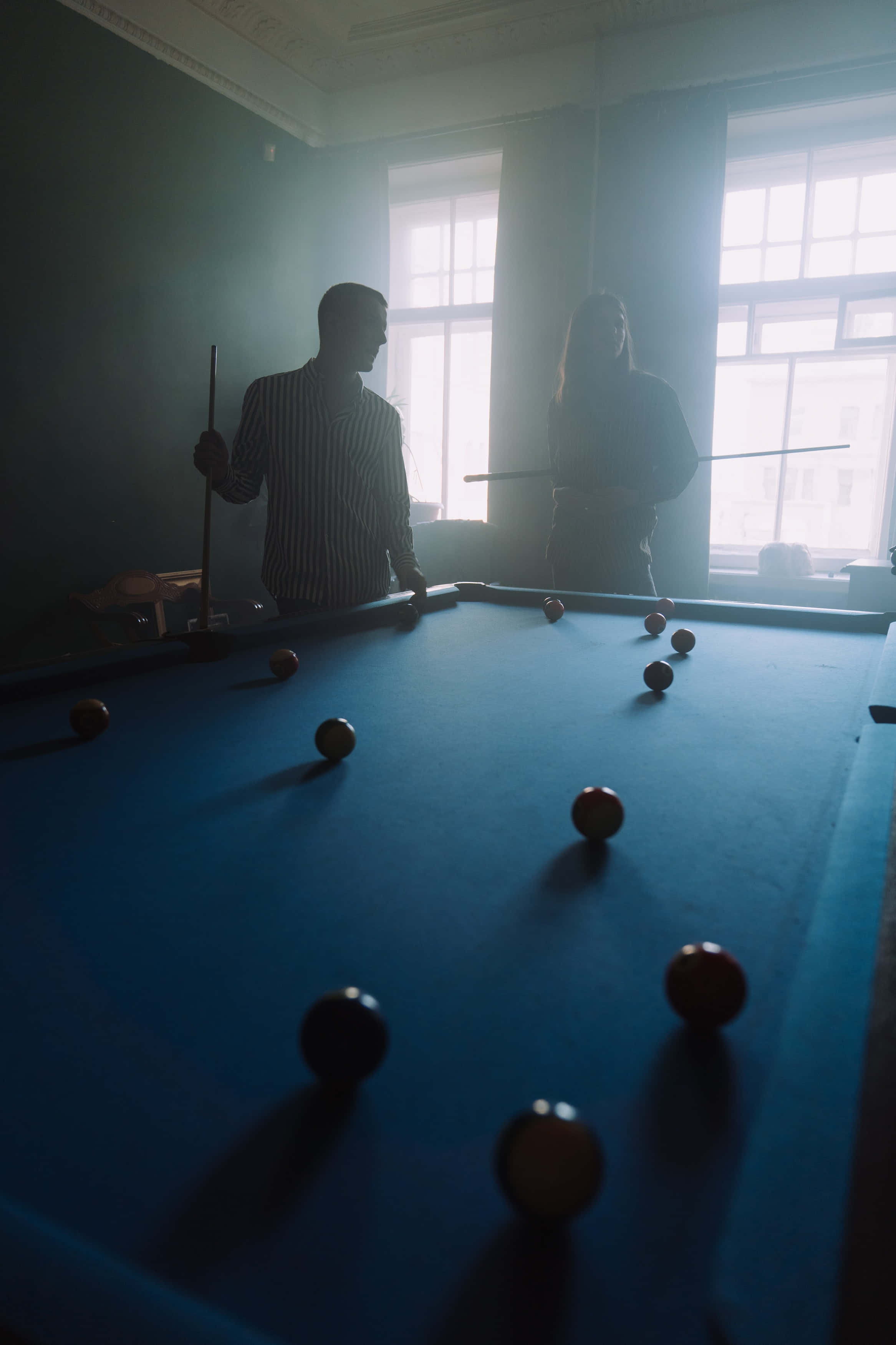 blue pool table, dim room, bright windows, 2K Phone Wallpaper