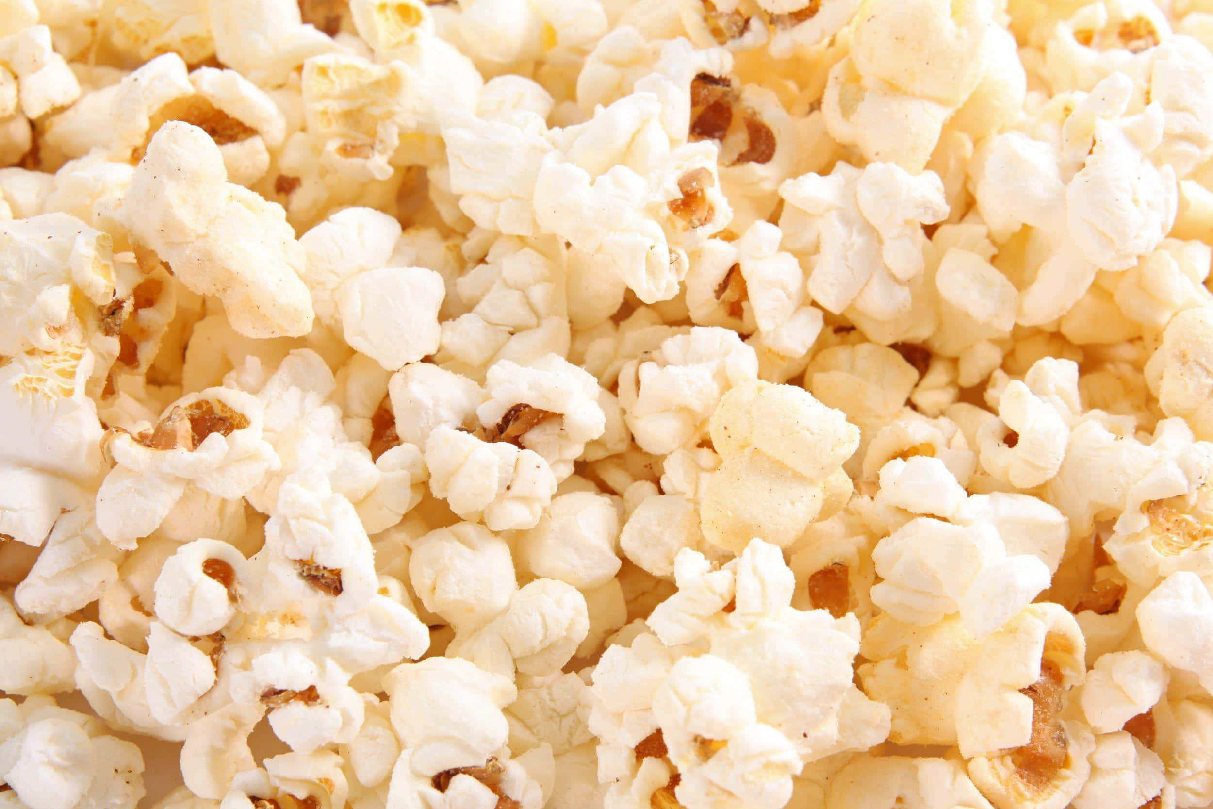 closeup popcorn texture, fluffy white popcorn kernels, golden-brown toasted spots, Full HD Desktop Wallpaper