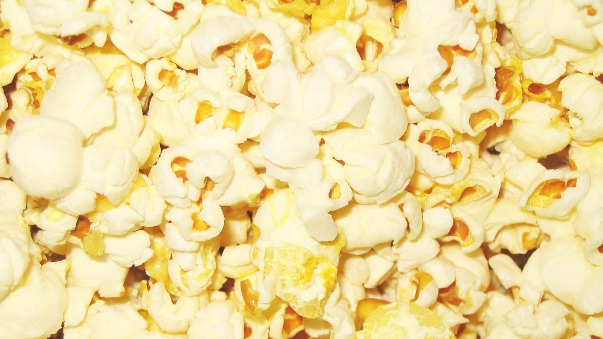 fluffy white popcorn kernels, golden-yellow buttery centers, close-up, Full HD Desktop Wallpaper