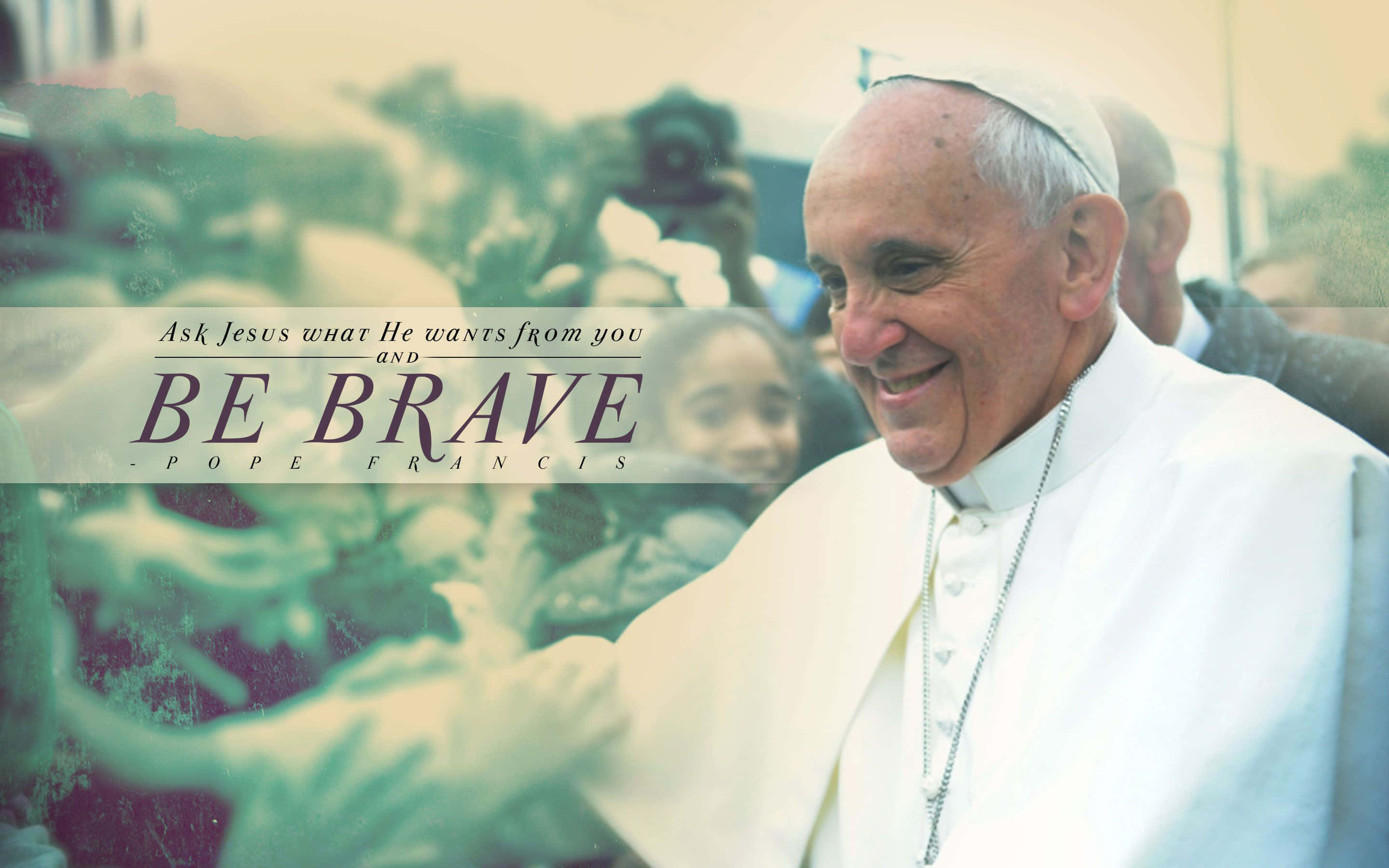 Pope Francis, smiles warmly, extending his hand, 2K Desktop Wallpaper