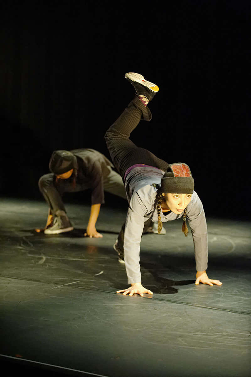 Popping, handstand, one leg kicked high, SD Phone Wallpaper