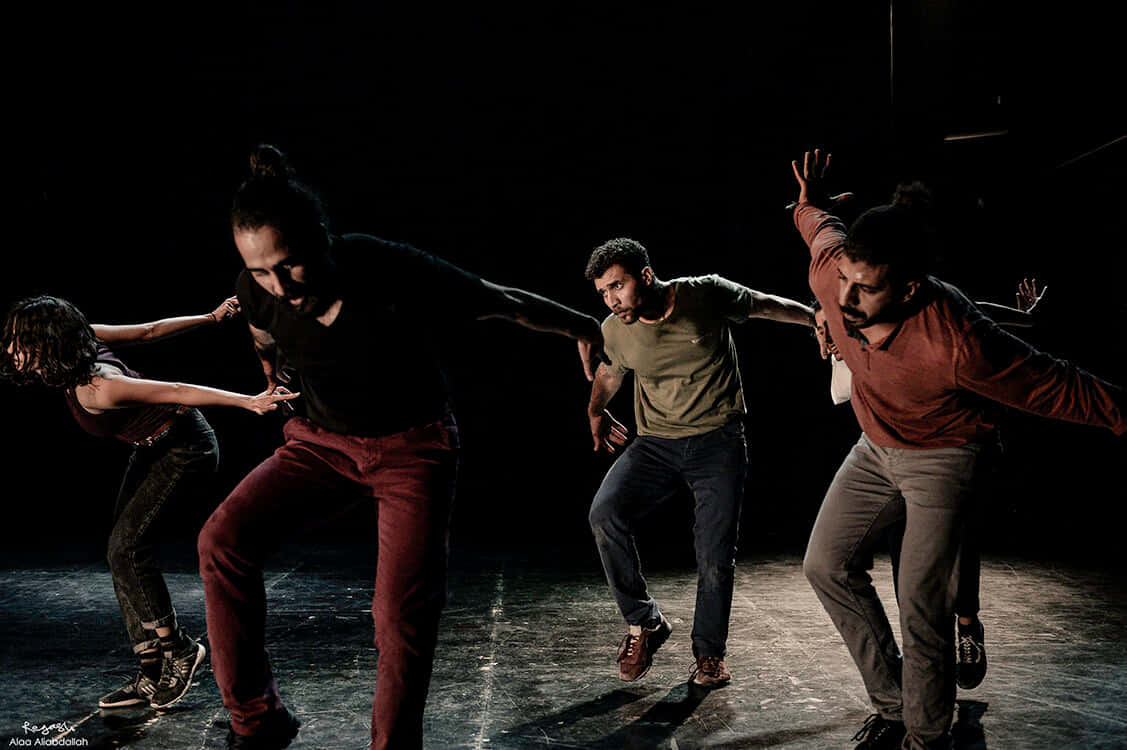 Popping Men Synchronized, black stage backdrop, spotlights, SD Desktop Wallpaper