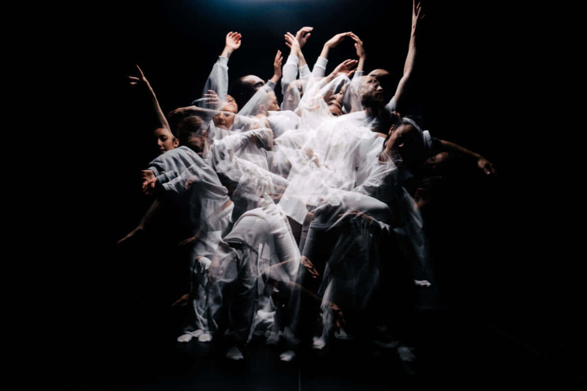 Popping, white flowing costumes, dramatic spotlight, SD Desktop Wallpaper