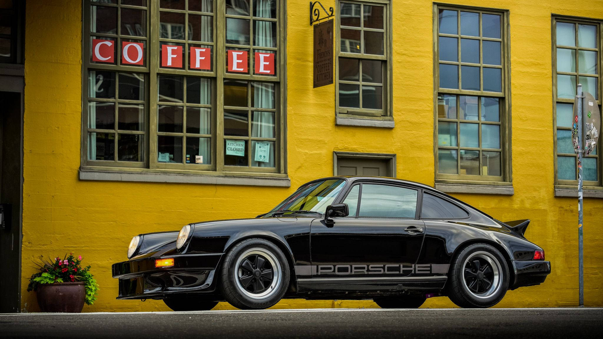 Porsche 911, black, vibrant yellow coffee shop, Full HD Desktop Wallpaper