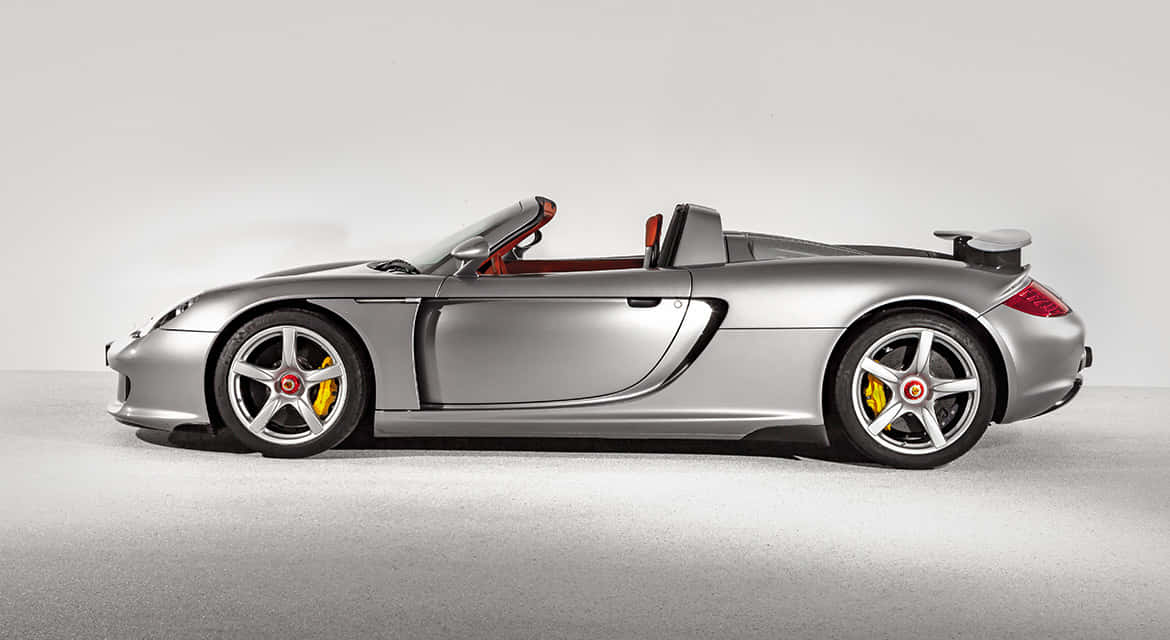 Porsche Carrera GT, silver, yellow brake calipers, SD Desktop Wallpaper
