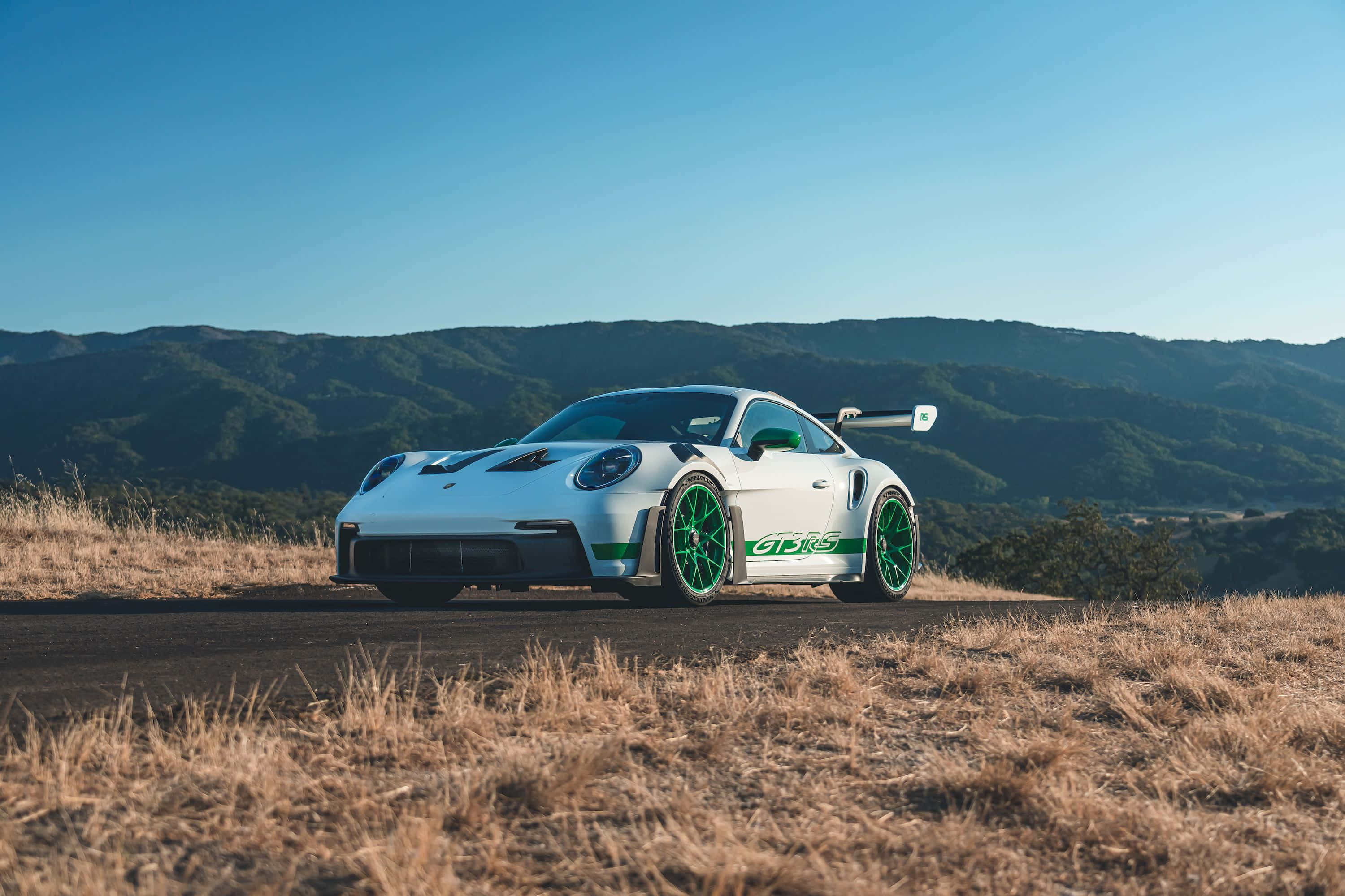 Porsche 911 GT3 RS, white, green accents, 2K Desktop Wallpaper